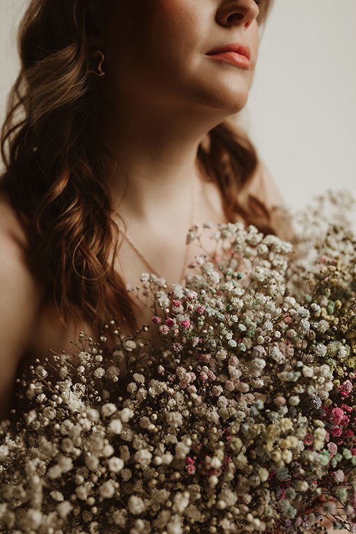 woman with flowers for wedding