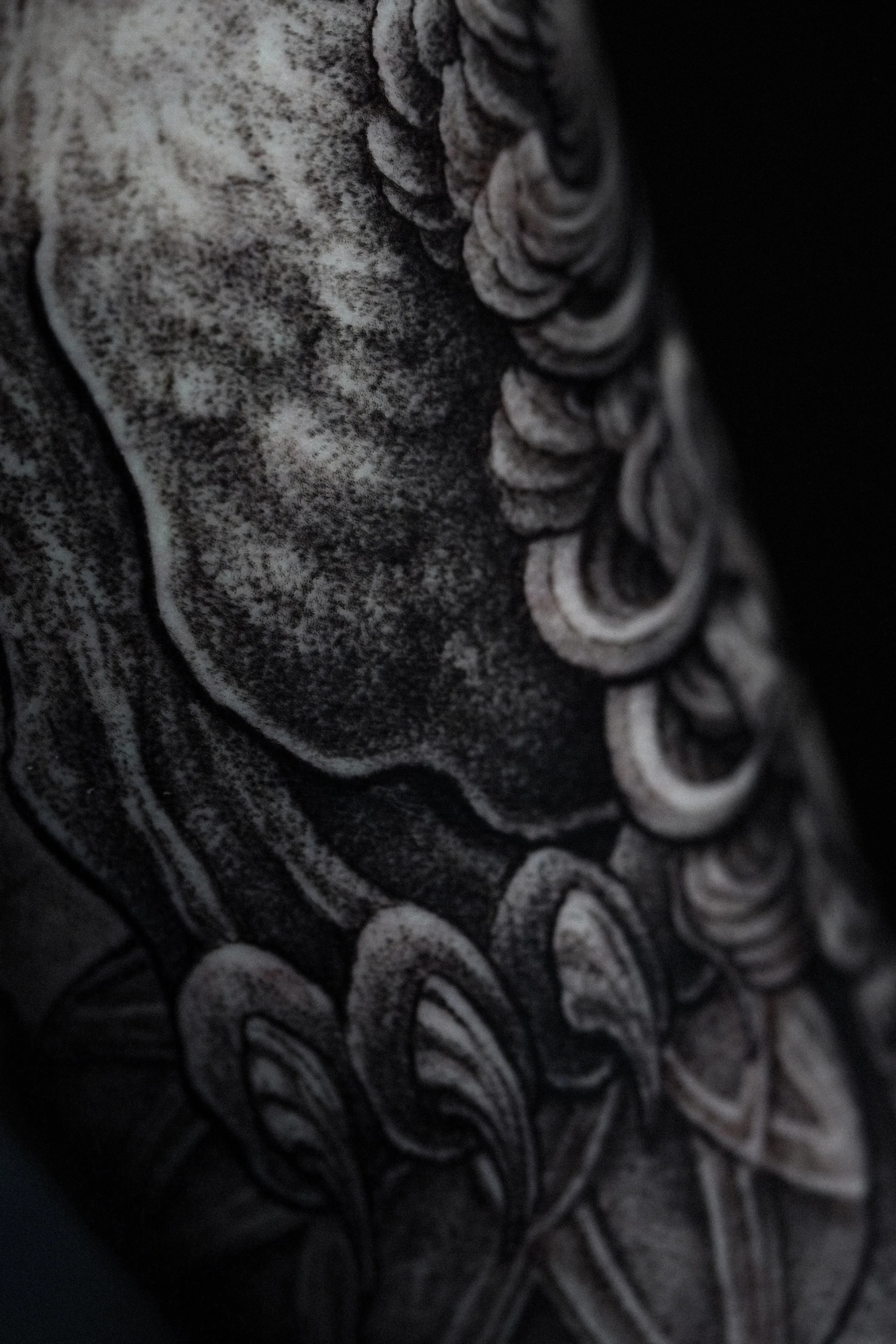 Macro texture detail — black and grey tattoo by Sasorii.