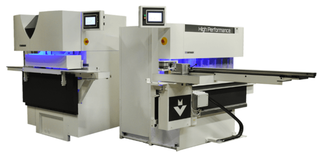 Industrial manufacturing machine with touchscreen monitors and a conveyor system.