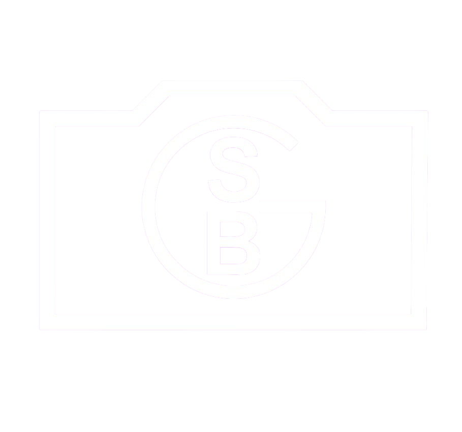 A camera icon with the letters S, B, and G inside a circle.