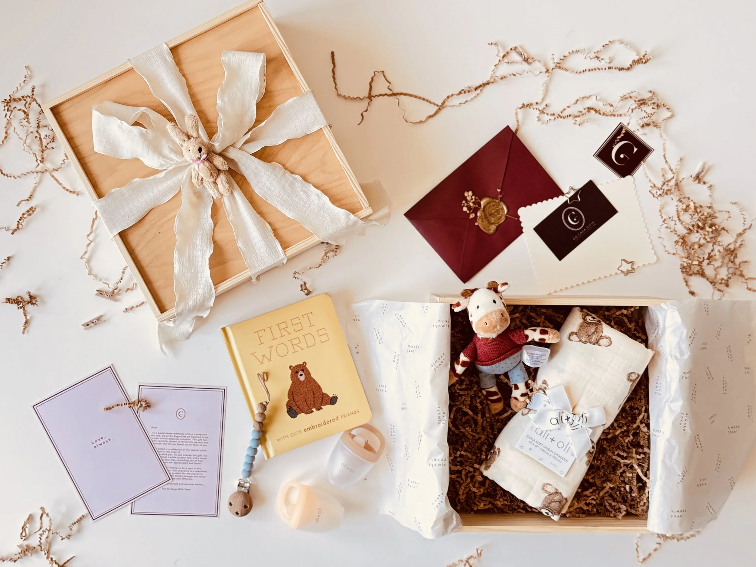 Little Bear's Welcome Bundle baby gift box with teddy bear swaddle and First Words board book by Go Gaga Gifts