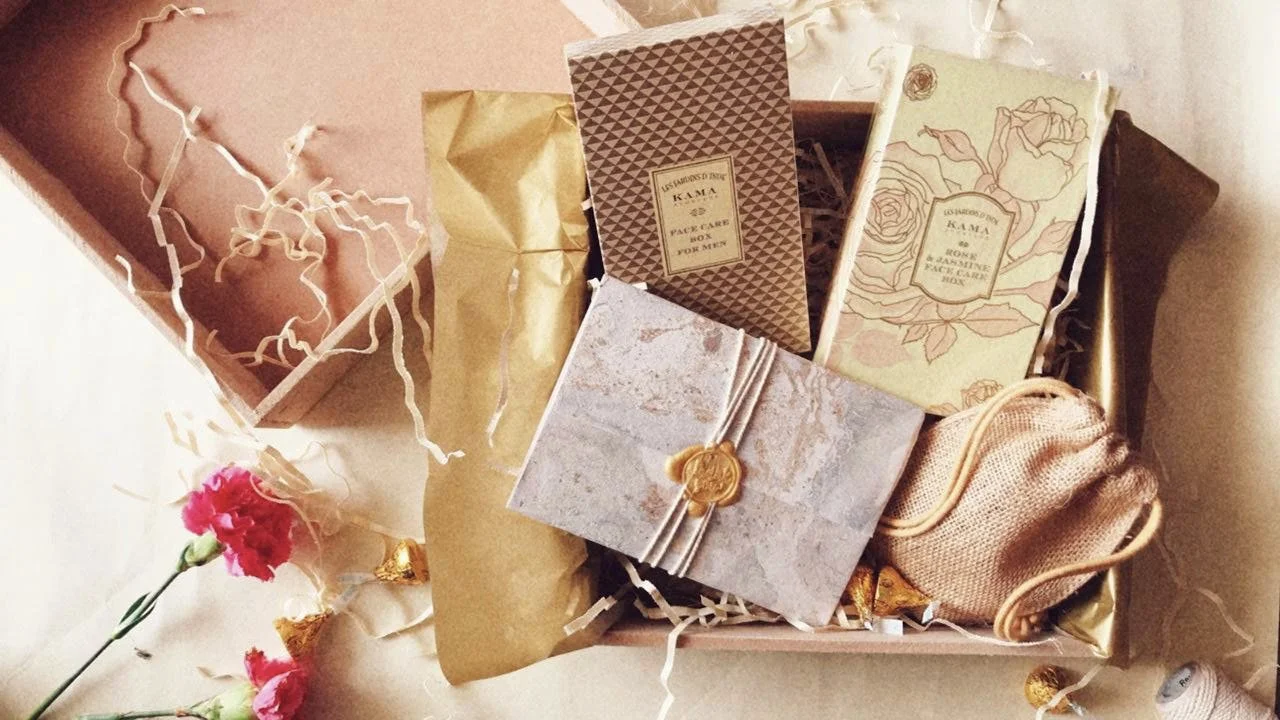 Elegant wedding favor gift box with personalized keepsakes and romantic packaging details