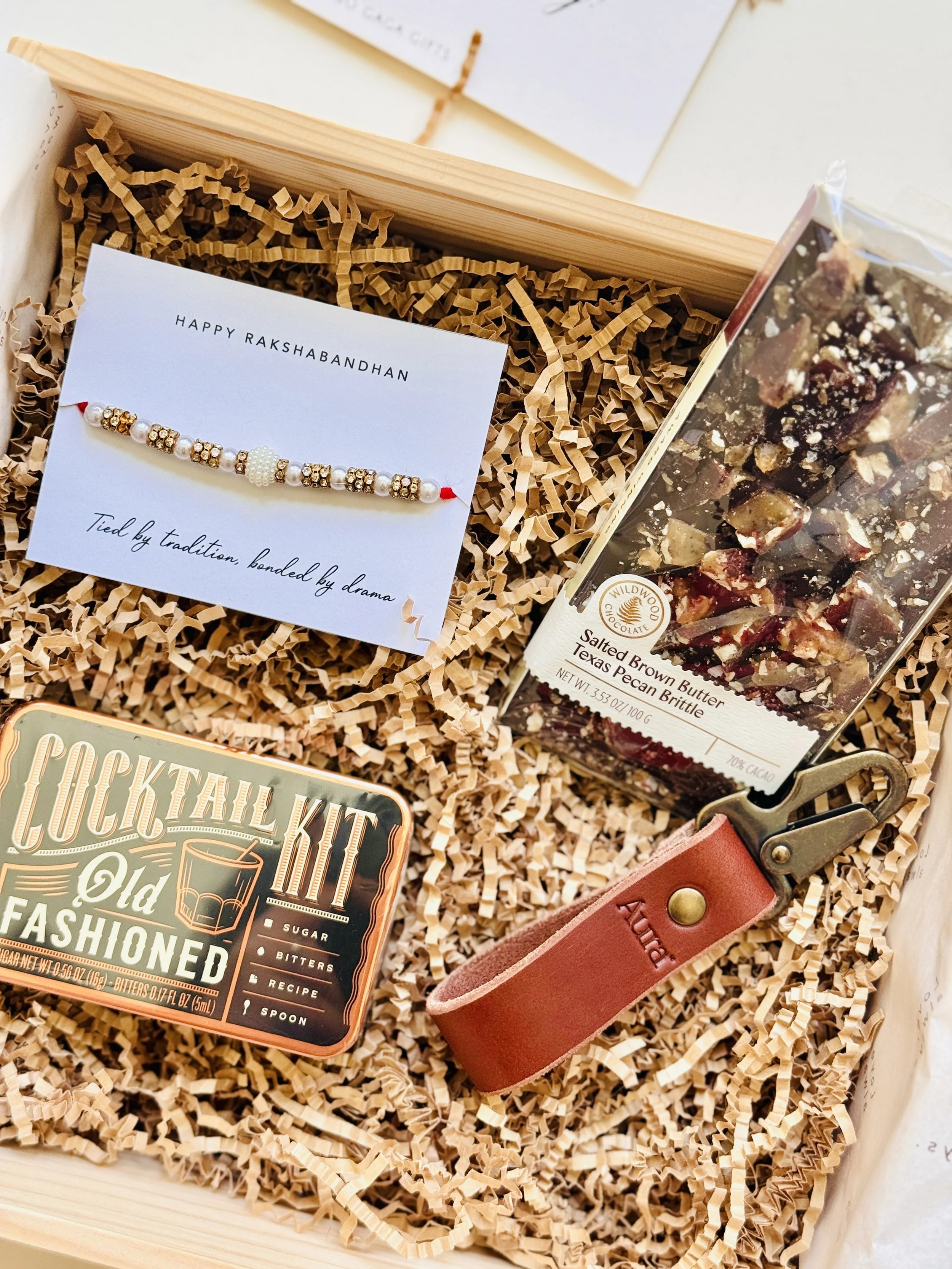 Cheers Bhai Rakhi box with modern festive packaging for brother-sister celebrations