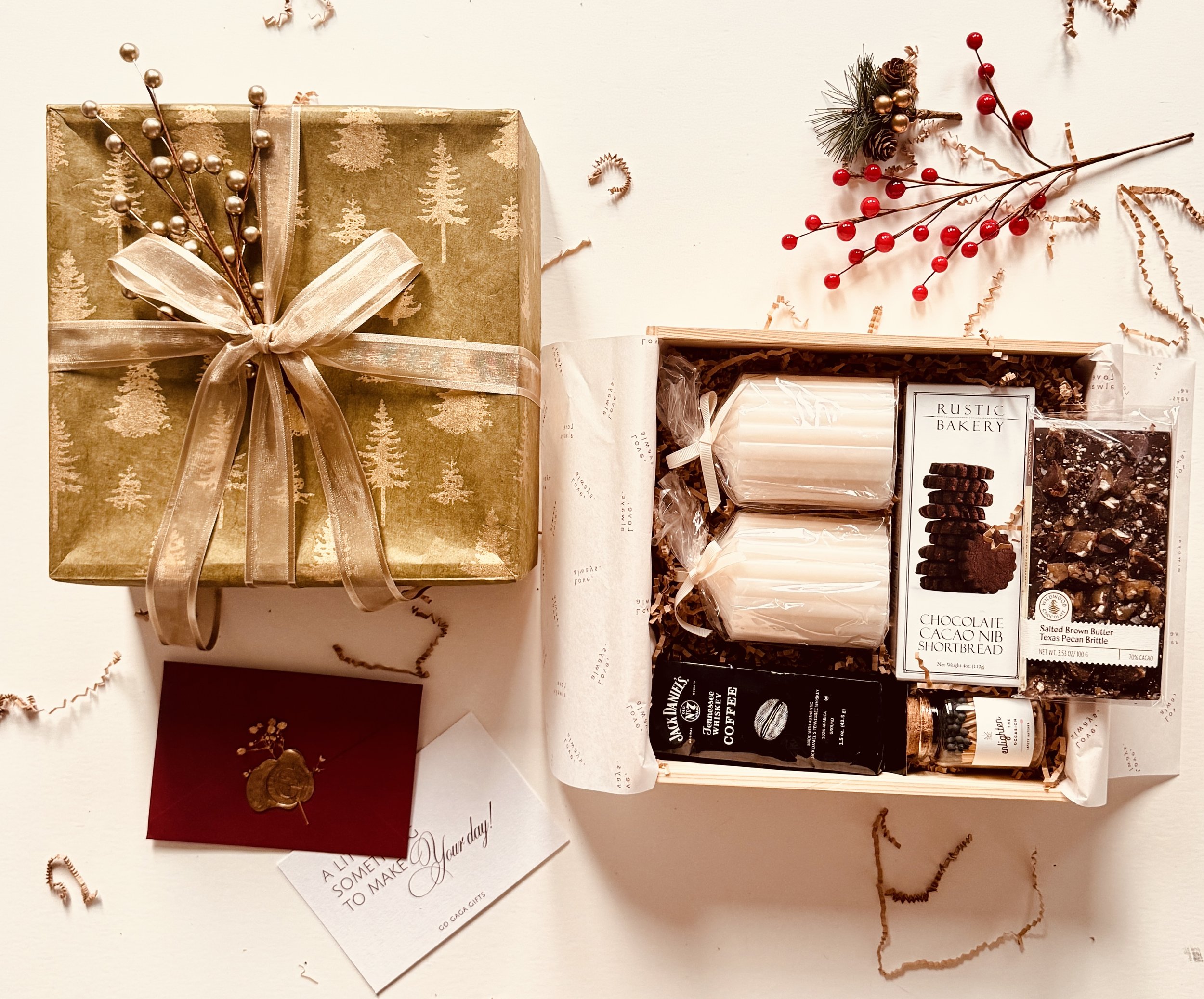 Holiday gift box featuring artisanal coffee, pecan brittle, and chocolate shortbread biscuits
