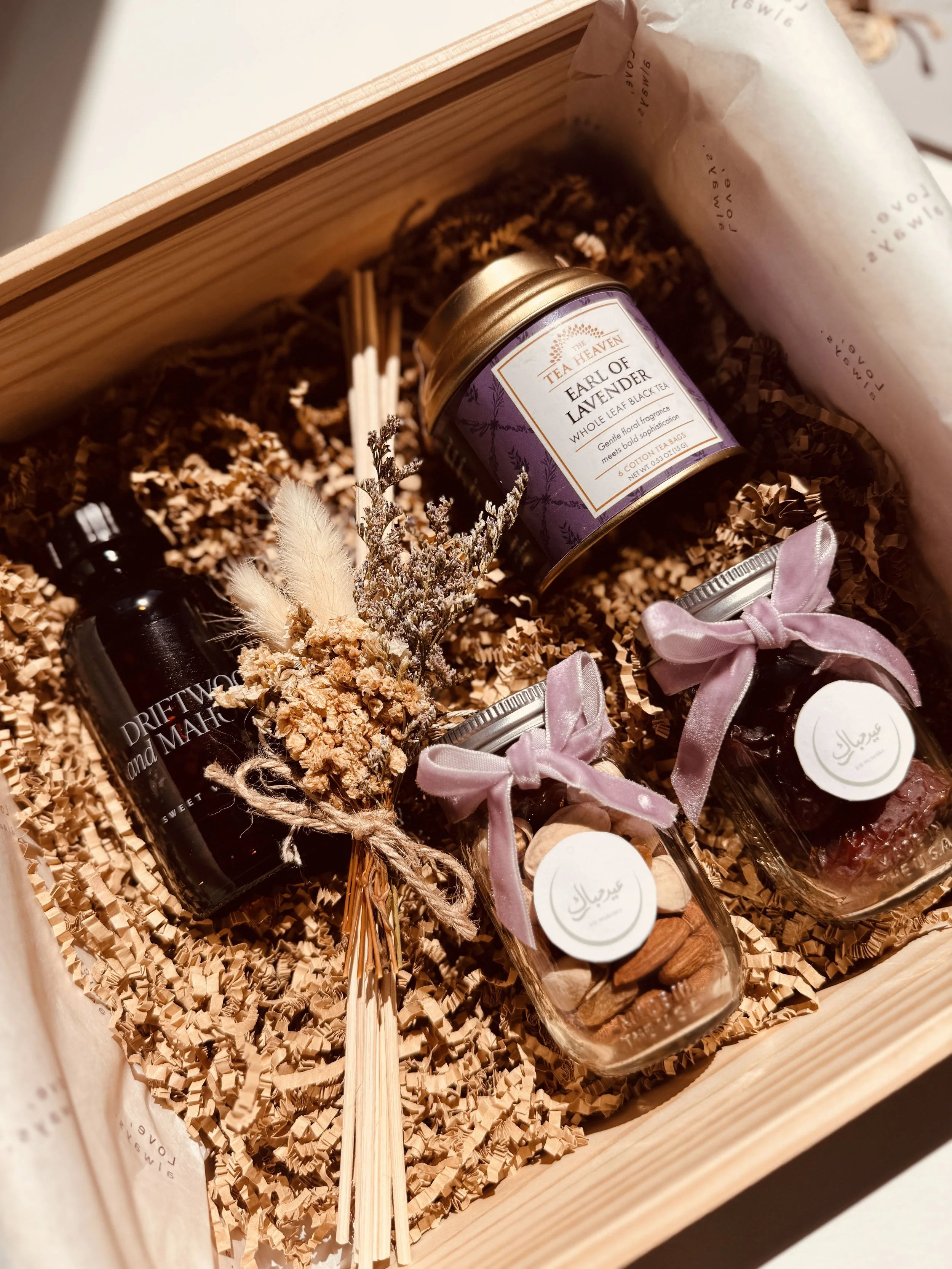 Premium Eid gift hamper with gourmet snacks, tea, and celebration-ready presentation