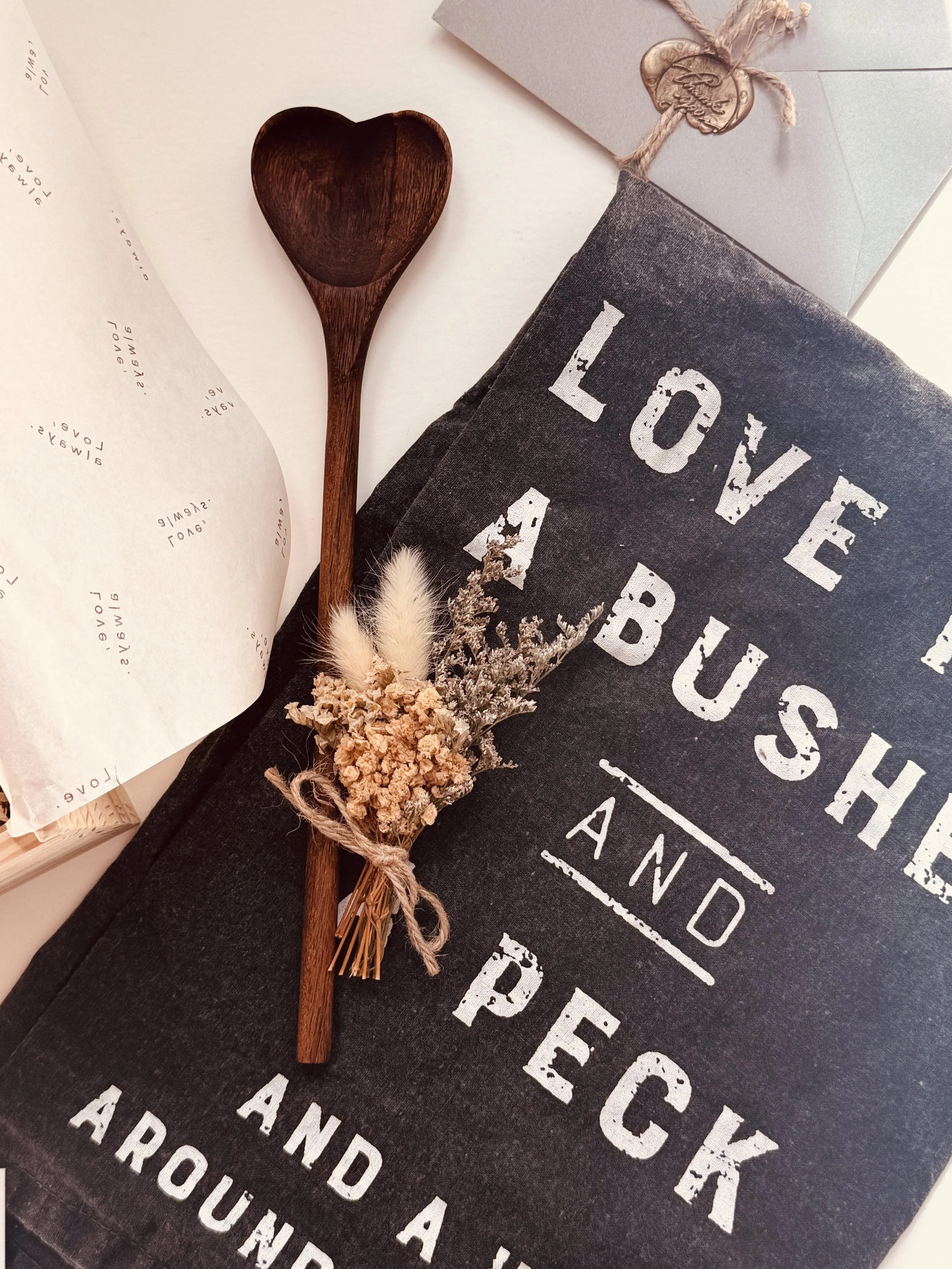 Thoughtful gift box for mom with curated self-care items and elegant ribbon packaging