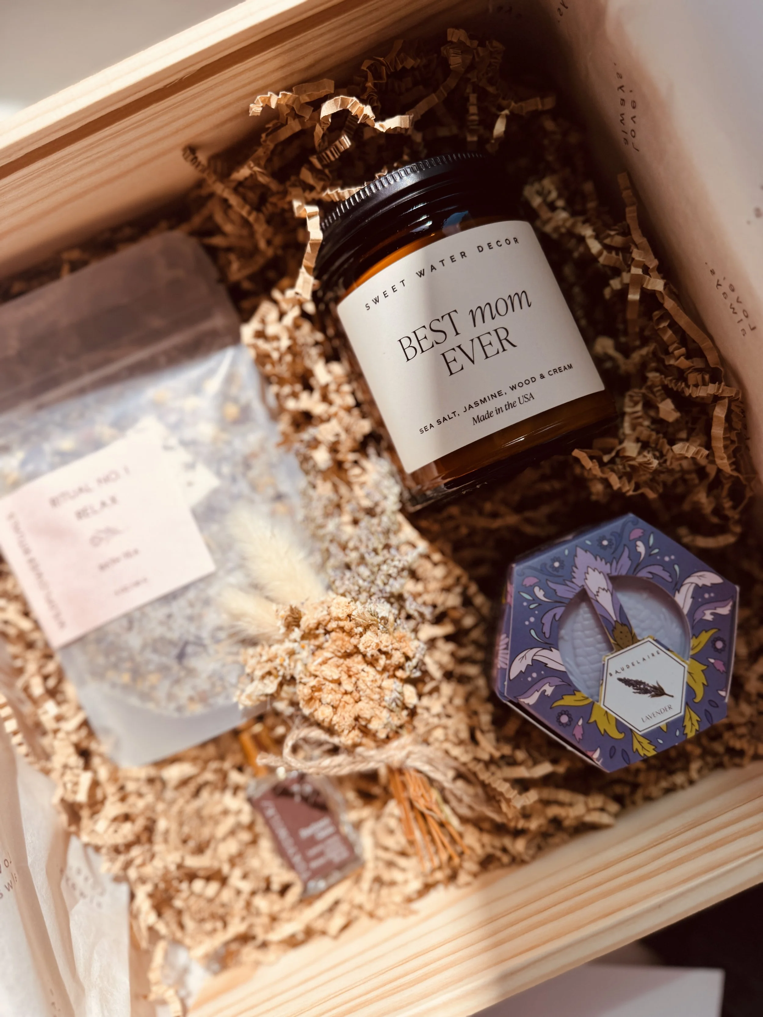 Luxury Mother's Day gift box with candle, bath and body gifts, and personalized note card