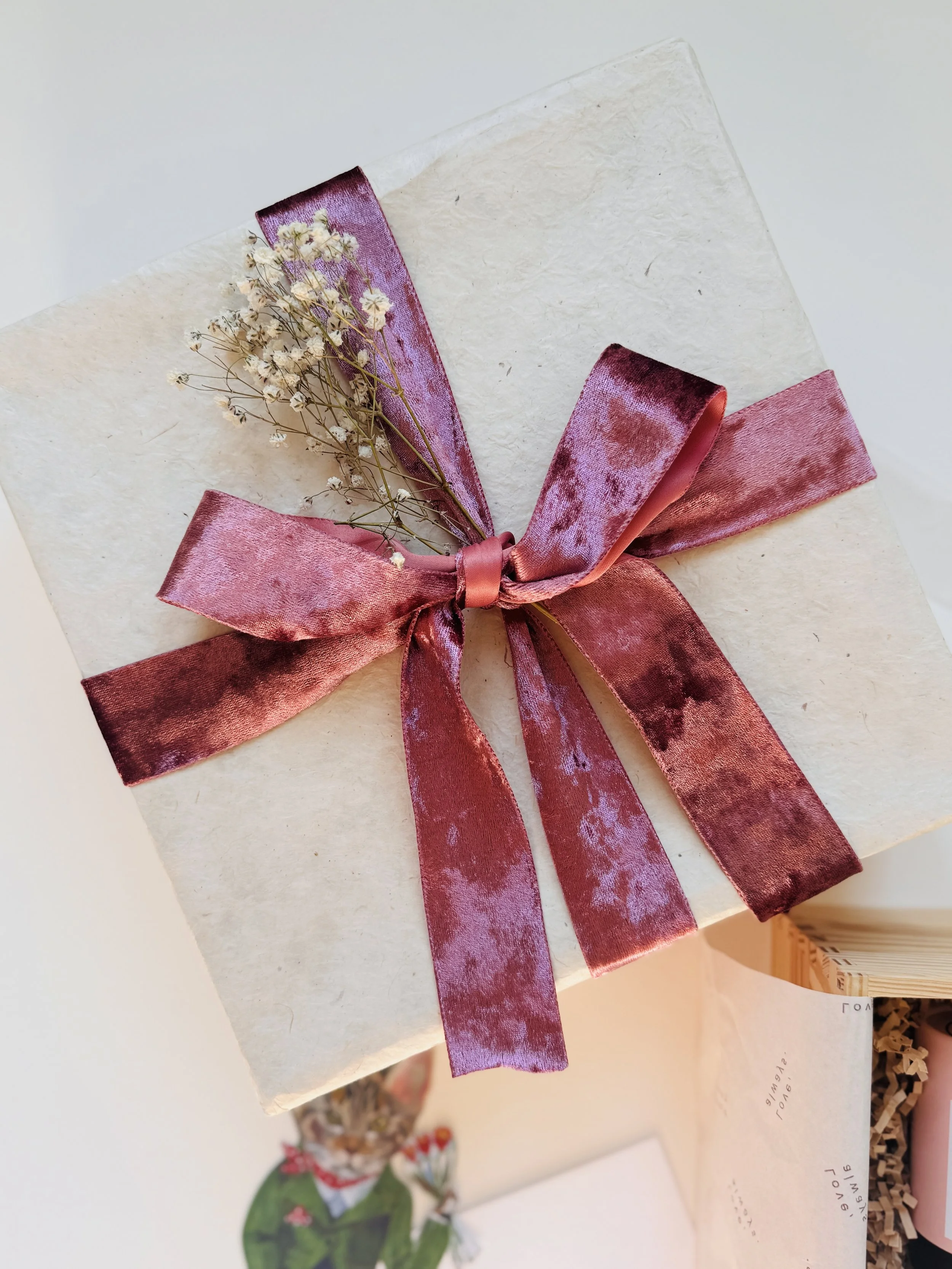 A Go Gaga Gifts keepsake box finished with a velvet ribbon