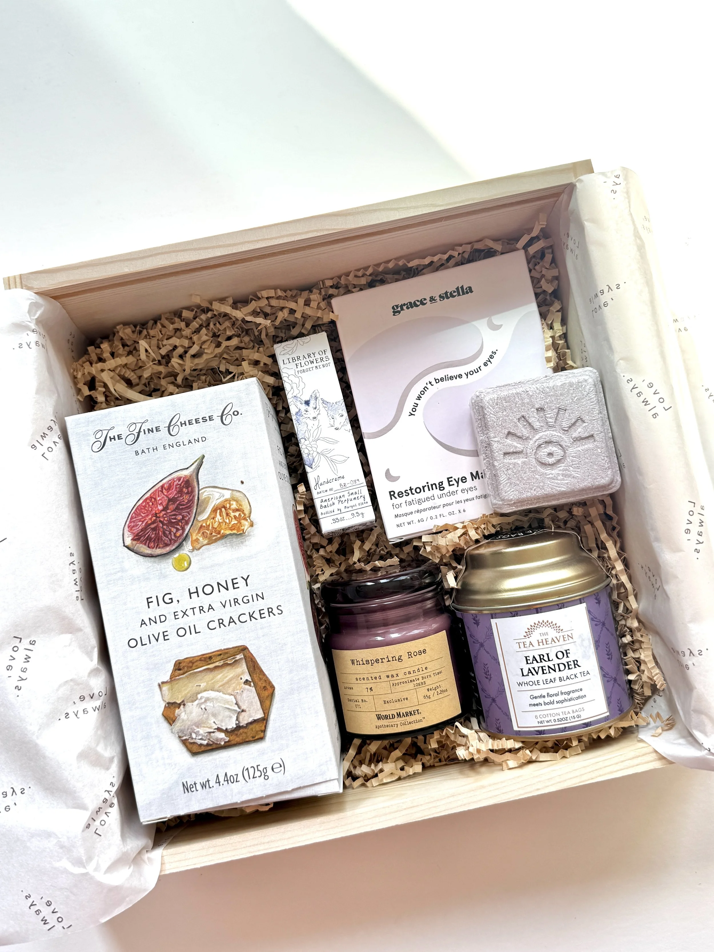 Client gift box contents laid out before packing, curated per recipient by Go Gaga Gifts