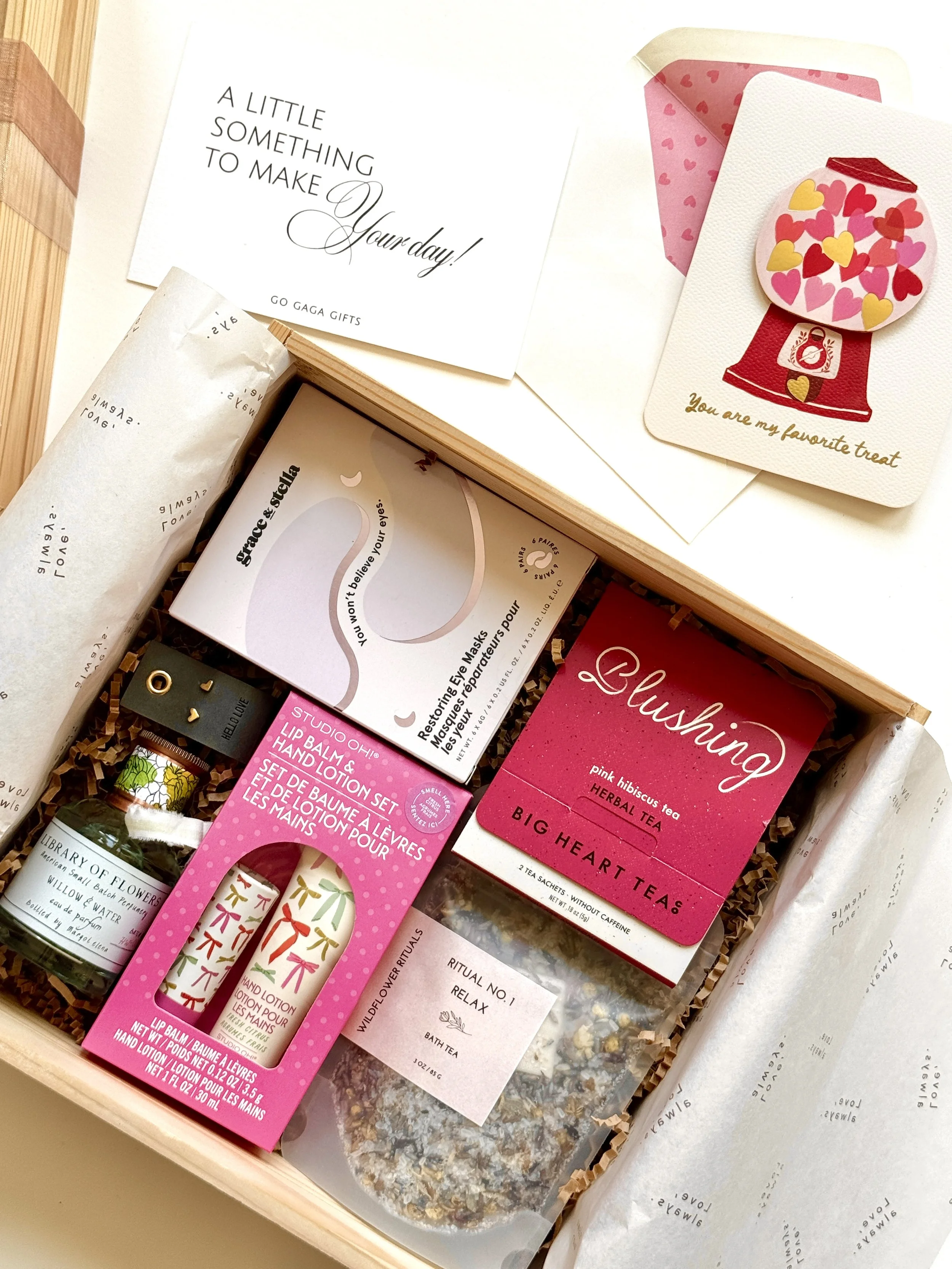 Open Blush & Bloom Box with self-care gifts and a heart-filled gumball design reading “you are my favorite treat”