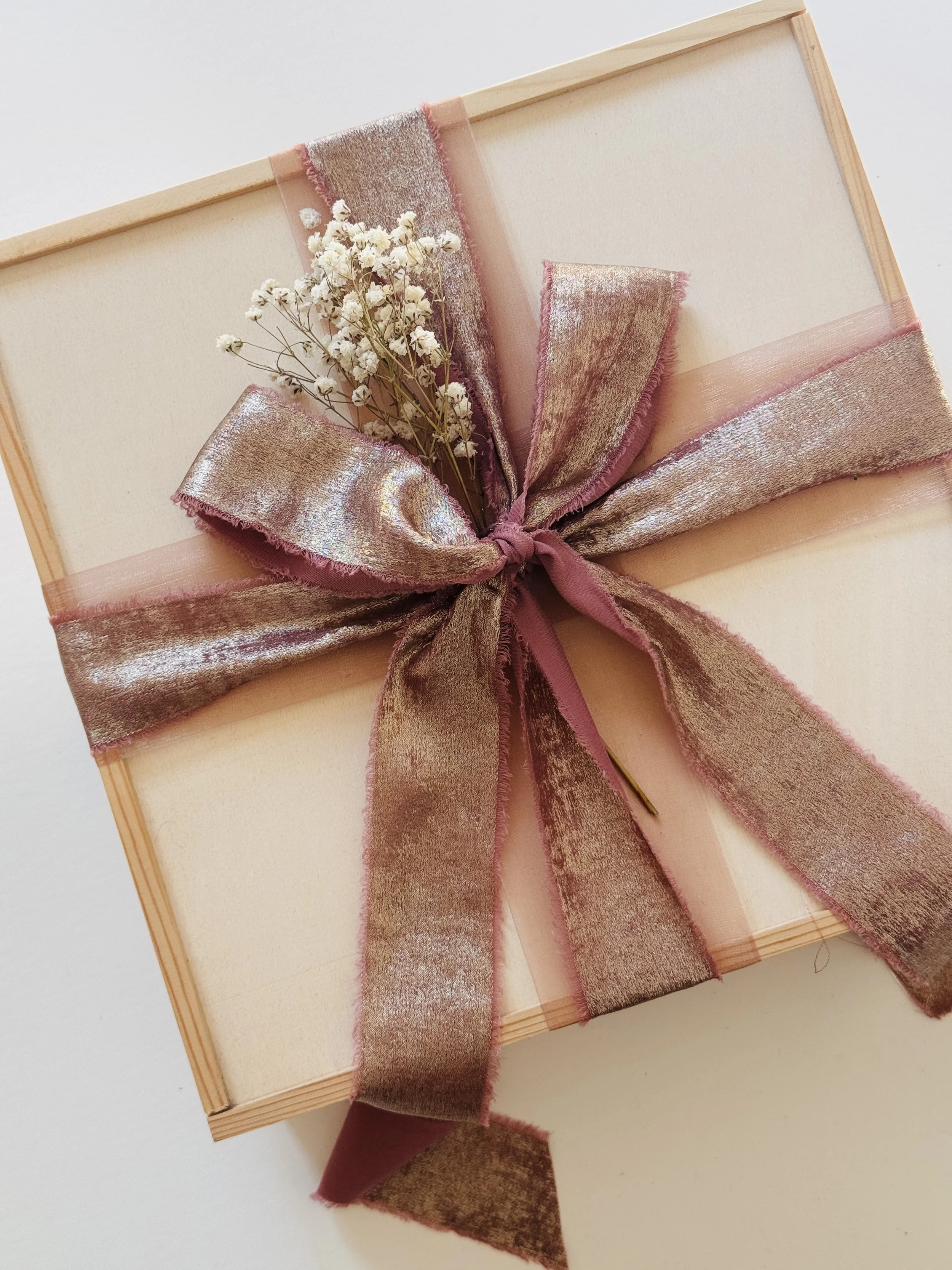 Close-up of a velvet ribbon on a curated Go Gaga Gifts box