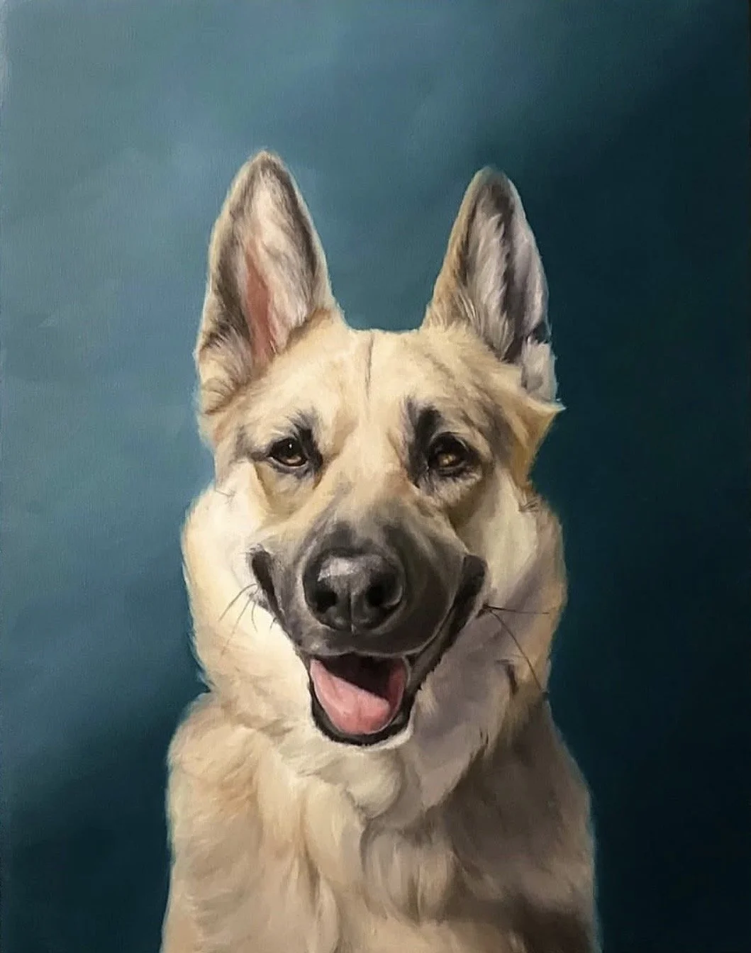 Portrait of a smiling mixed-breed dog with large ears, black markings on face, and light tan fur, against a teal background.