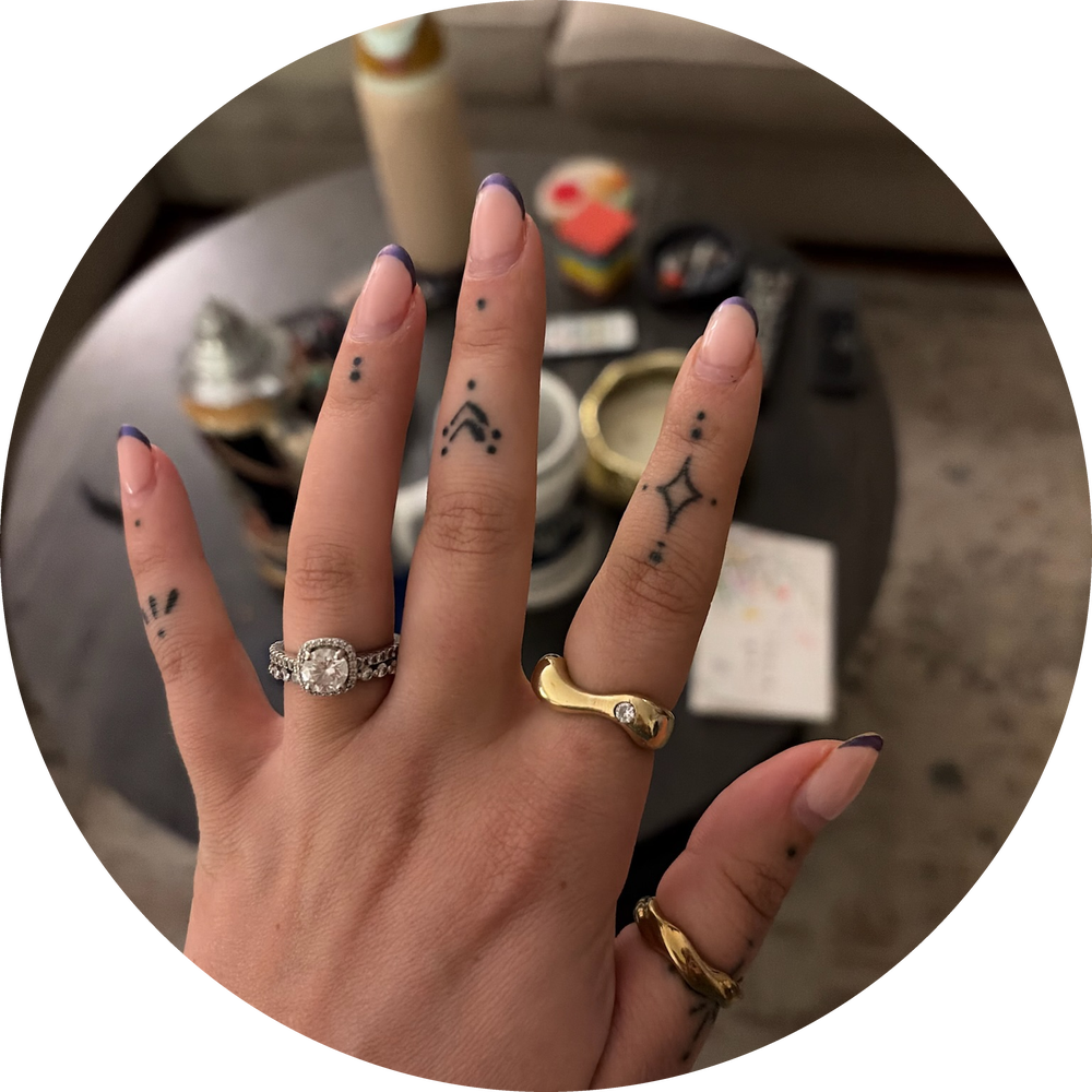 Brianna, wearing the brass wave ring with cubic zirconia