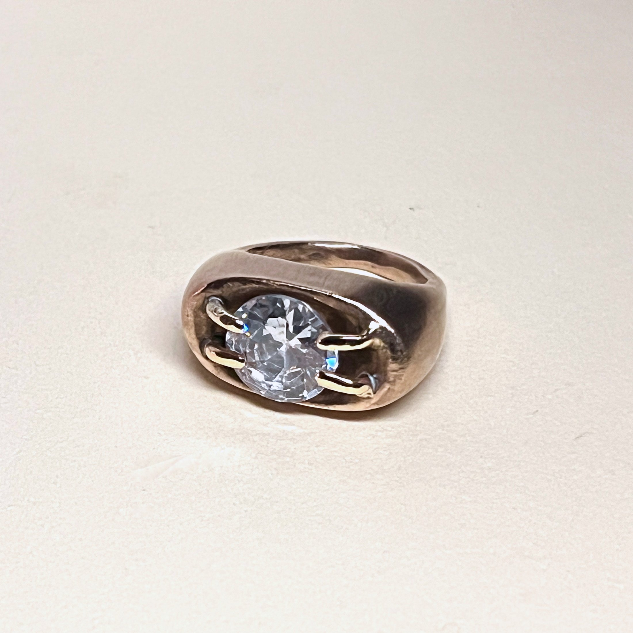 Cocktail ring — faceted cubic zirconia set in bronze.
Band 5mm tapering to 2mm · thickness 2mm · stone 11mm