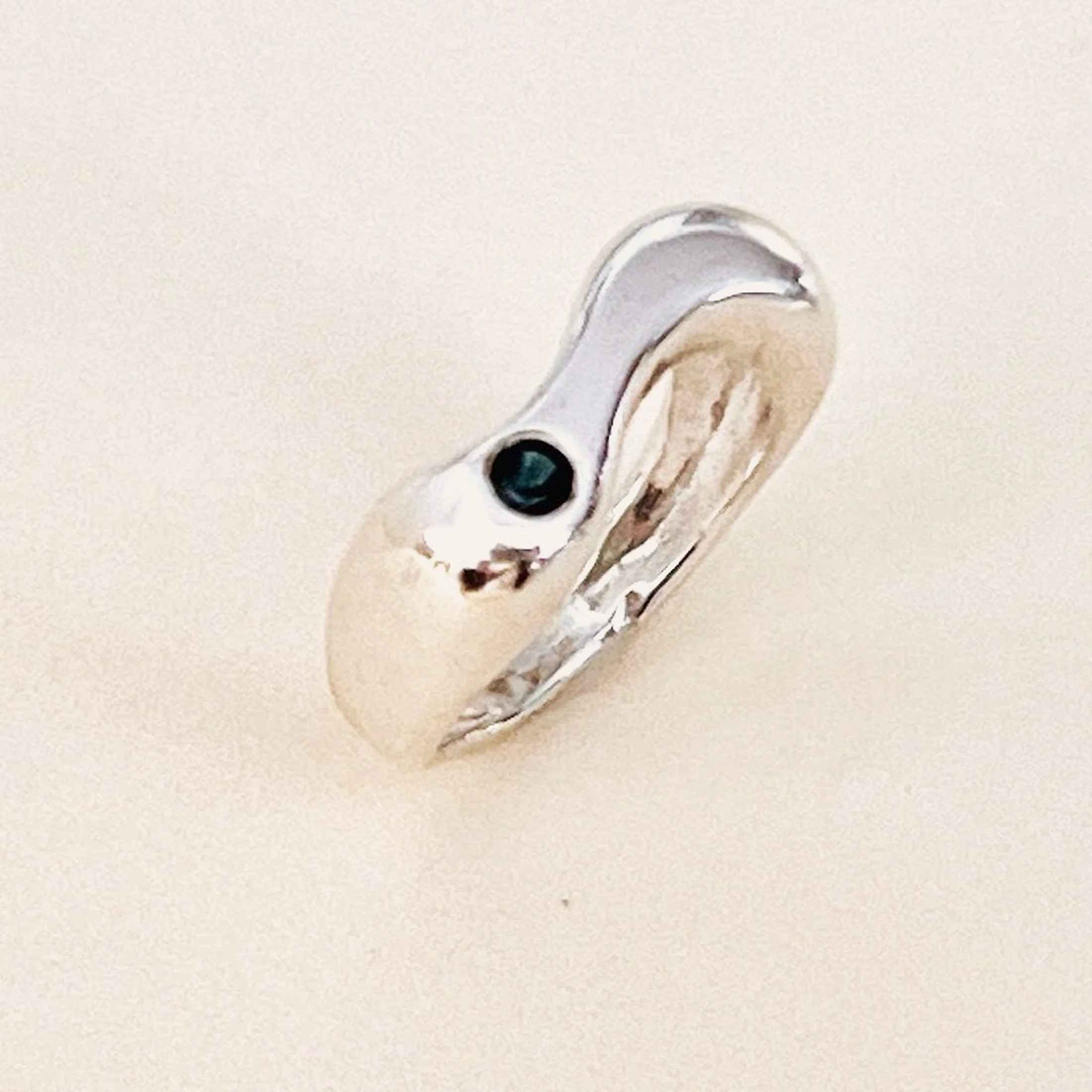 Wave band ring — blue topaz set in sterling silver band.
Band 6mm · thickness 2mm · stone 3mm