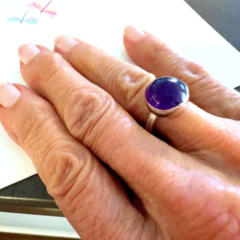 Susan, wearing the amethyst cabochon ring. "It is beautiful and fits perfectly and I love it."