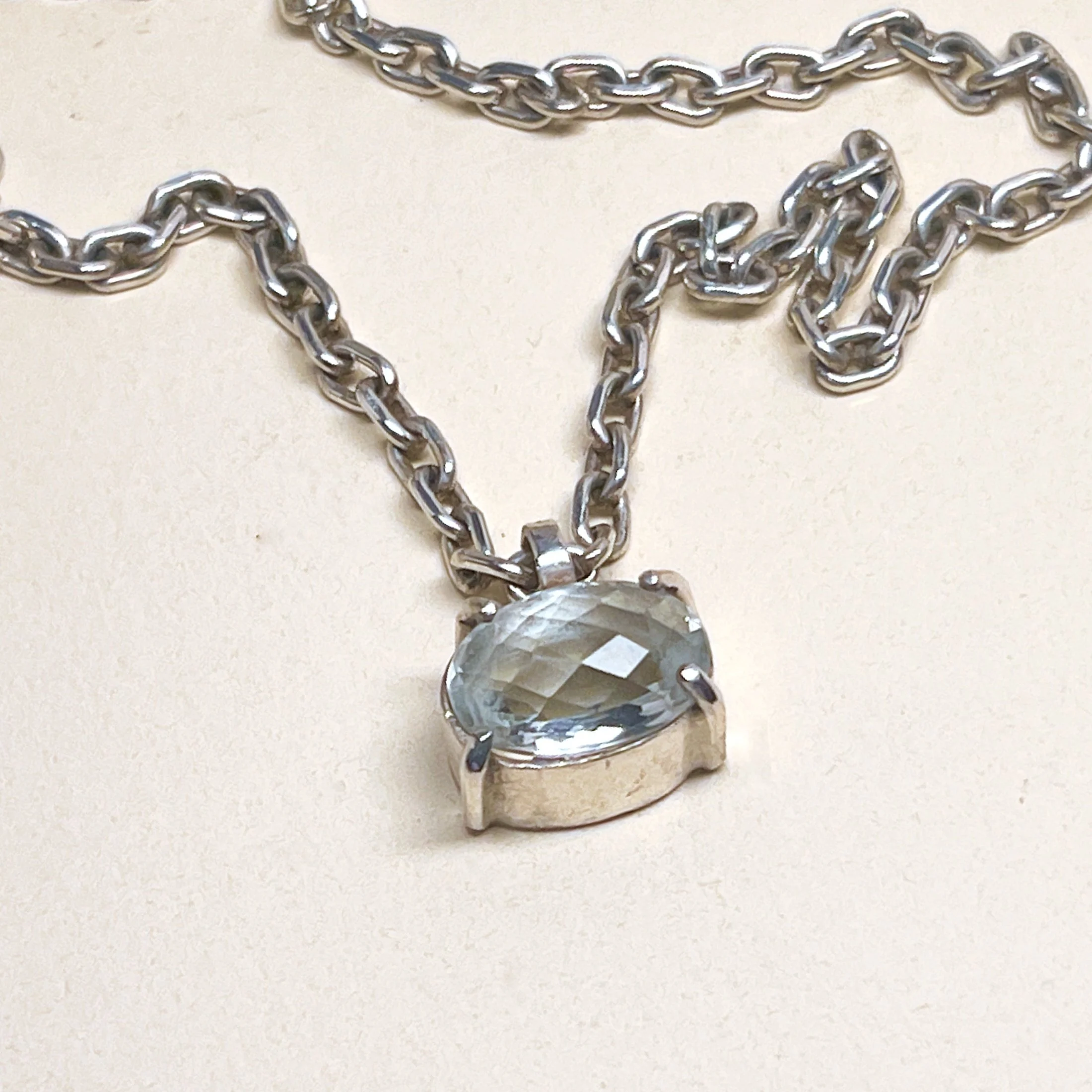 Pendant — checkerboard-cut green amethyst on a heavy sterling silver cable chain.  
Chain 16.5 in · stone 10x12mm
