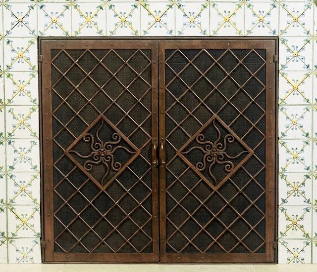 Forged iron custom fireplace screen