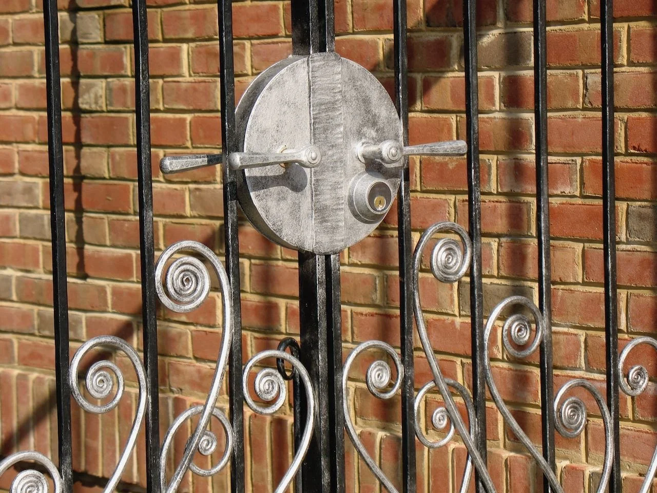 Forged iron exterior gate inspired by Art nouveau