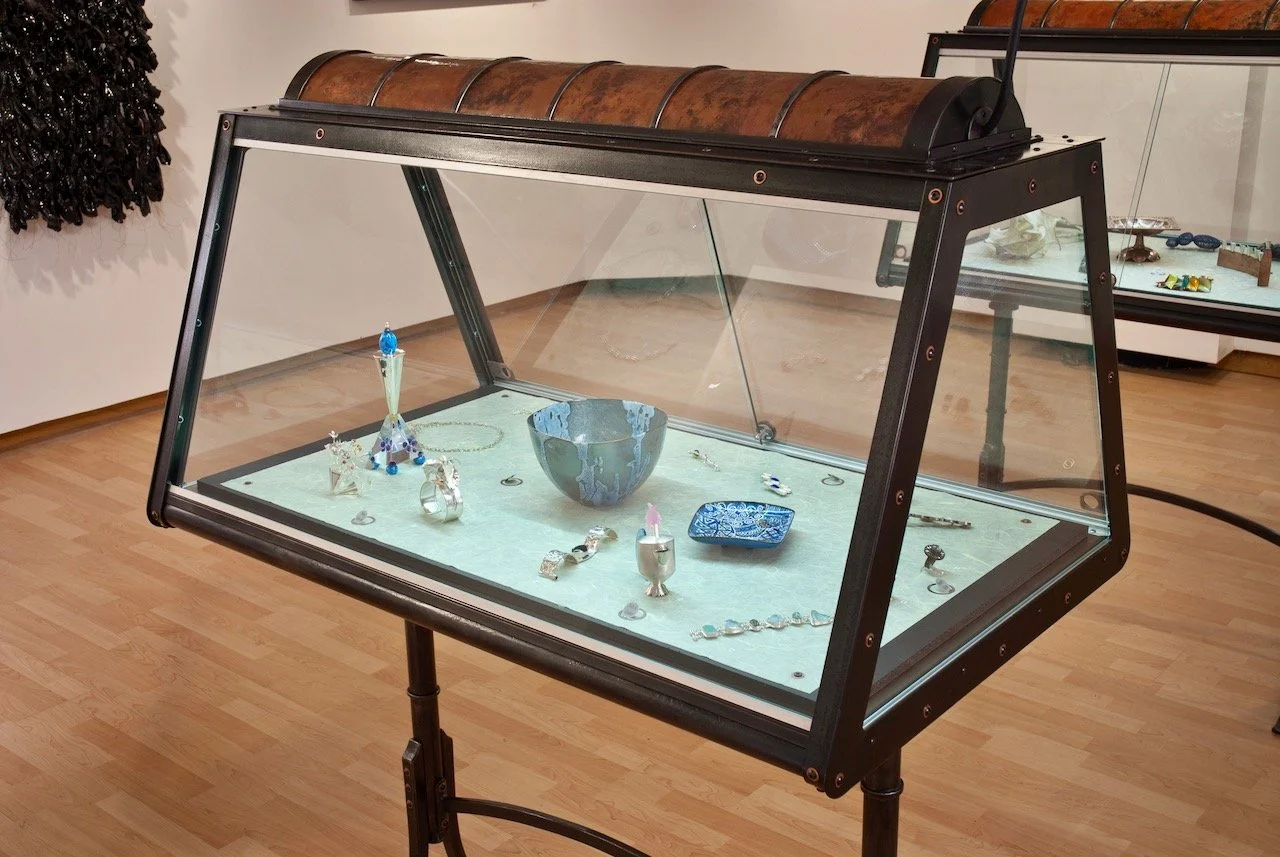 Forged iron and copper steampunk display cases with glass
