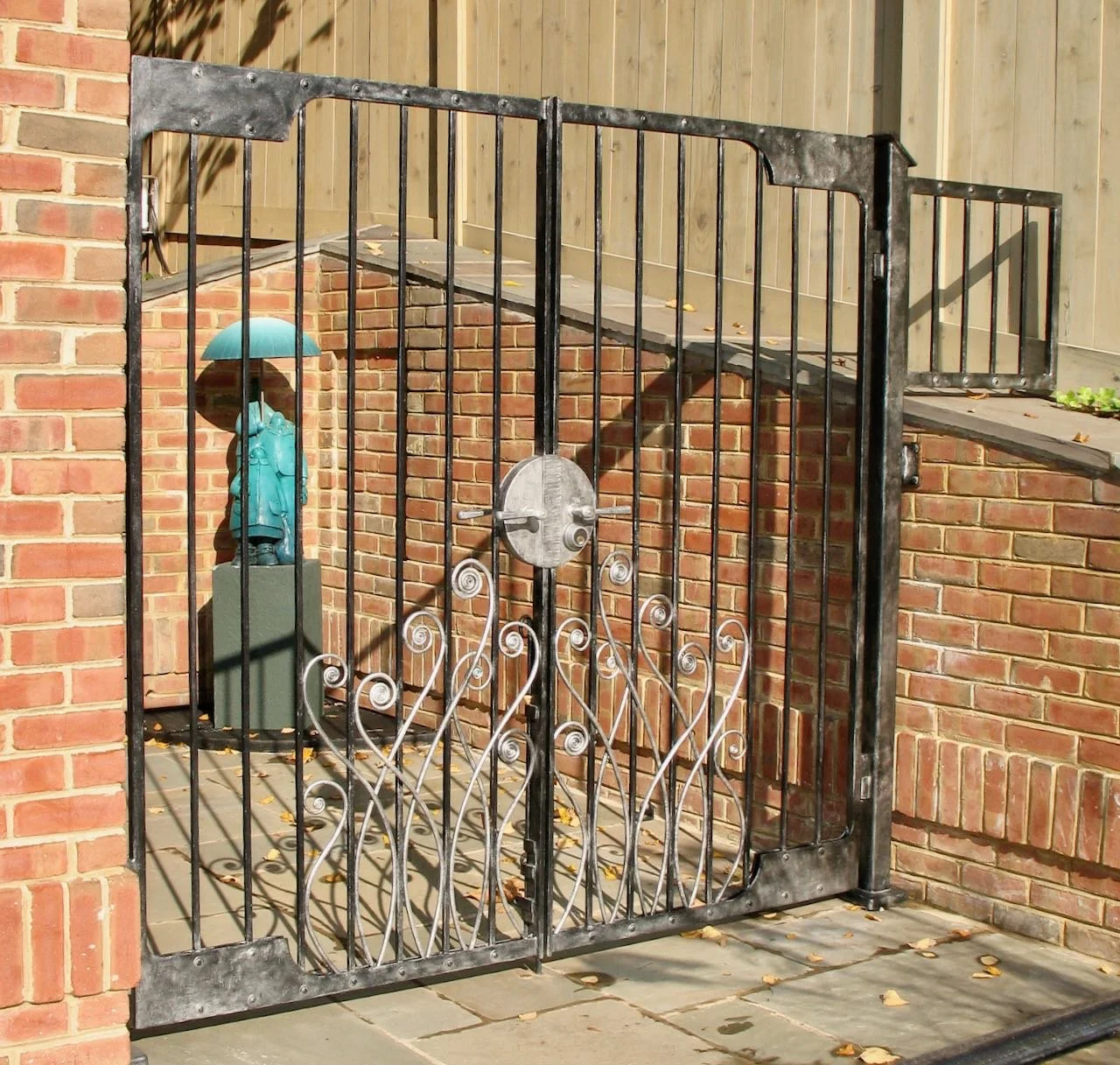 Forged iron exterior gate inspired by Art nouveau