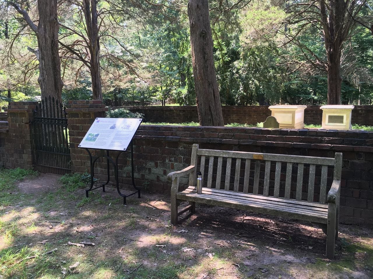 Gunston Hall burial ground with forged iron stanchion and panel.