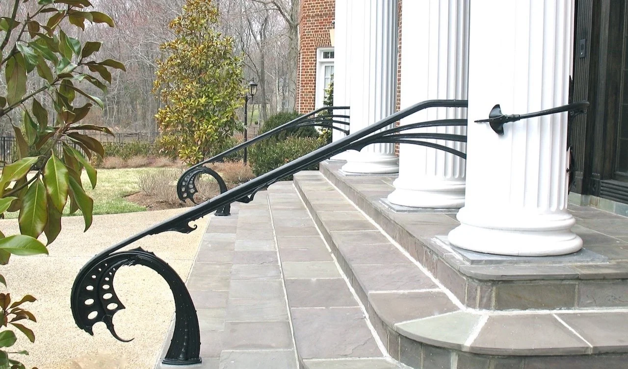 Forged iron steampunk exterior handrails, inspired by Art nouveau