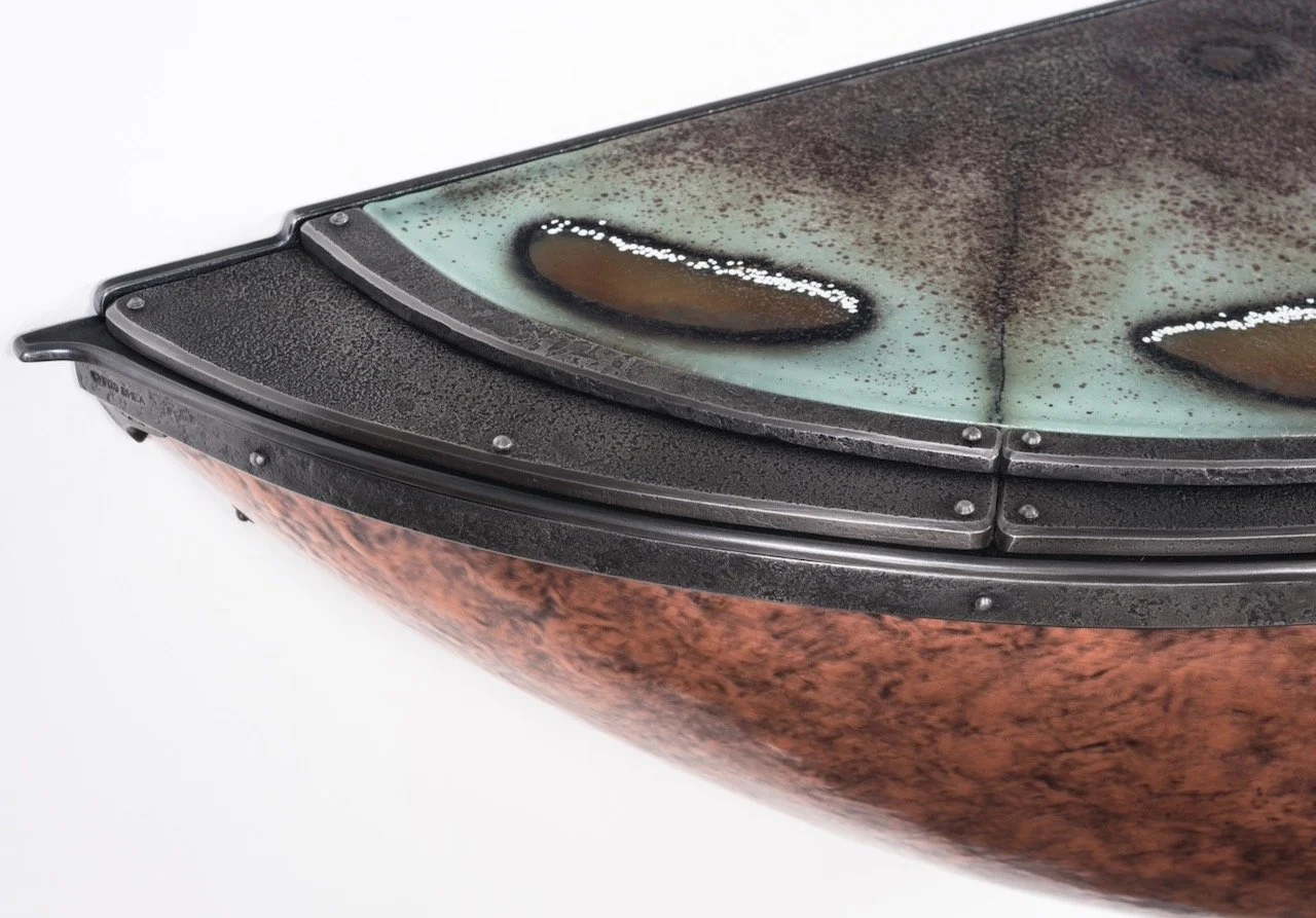 Forged iron and copper steampunk demilune table with sgraffito glass top