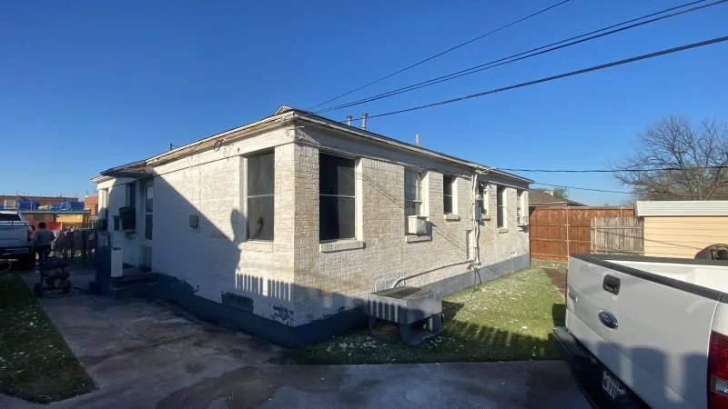 Before: original tan brick exterior of a single-story Dallas-Fort Worth home prior to MZL Construction's full exterior repaint