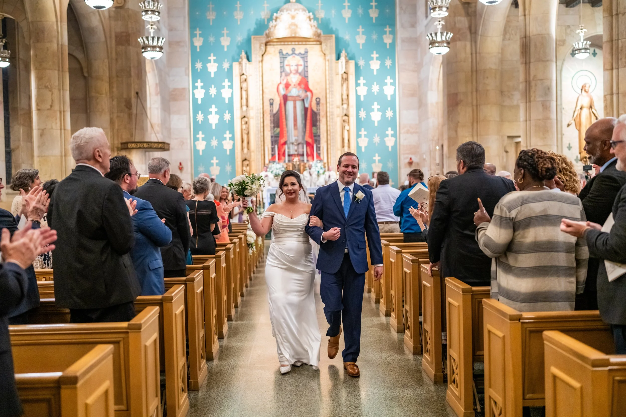 Julianna and Jordan Peek following their Catholic wedding ceremony.