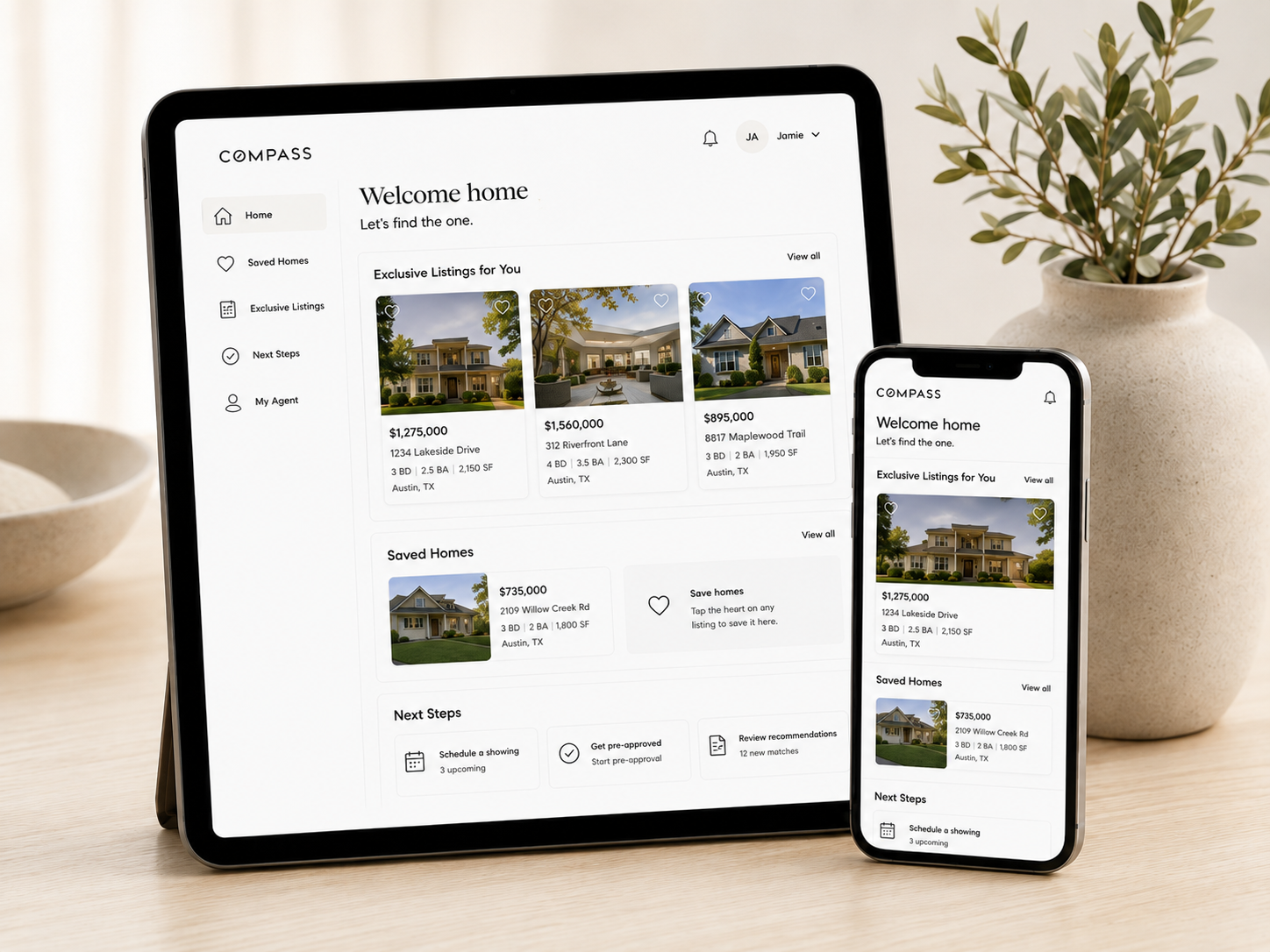 A tablet and a smartphone display a real estate app called 'Compass' showing home listings and saved homes. The tablet shows multiple home listings with prices and details, while the smartphone shows a close-up of one listing and saved homes. The devices are on a wood table with a potted plant and a bowl nearby.