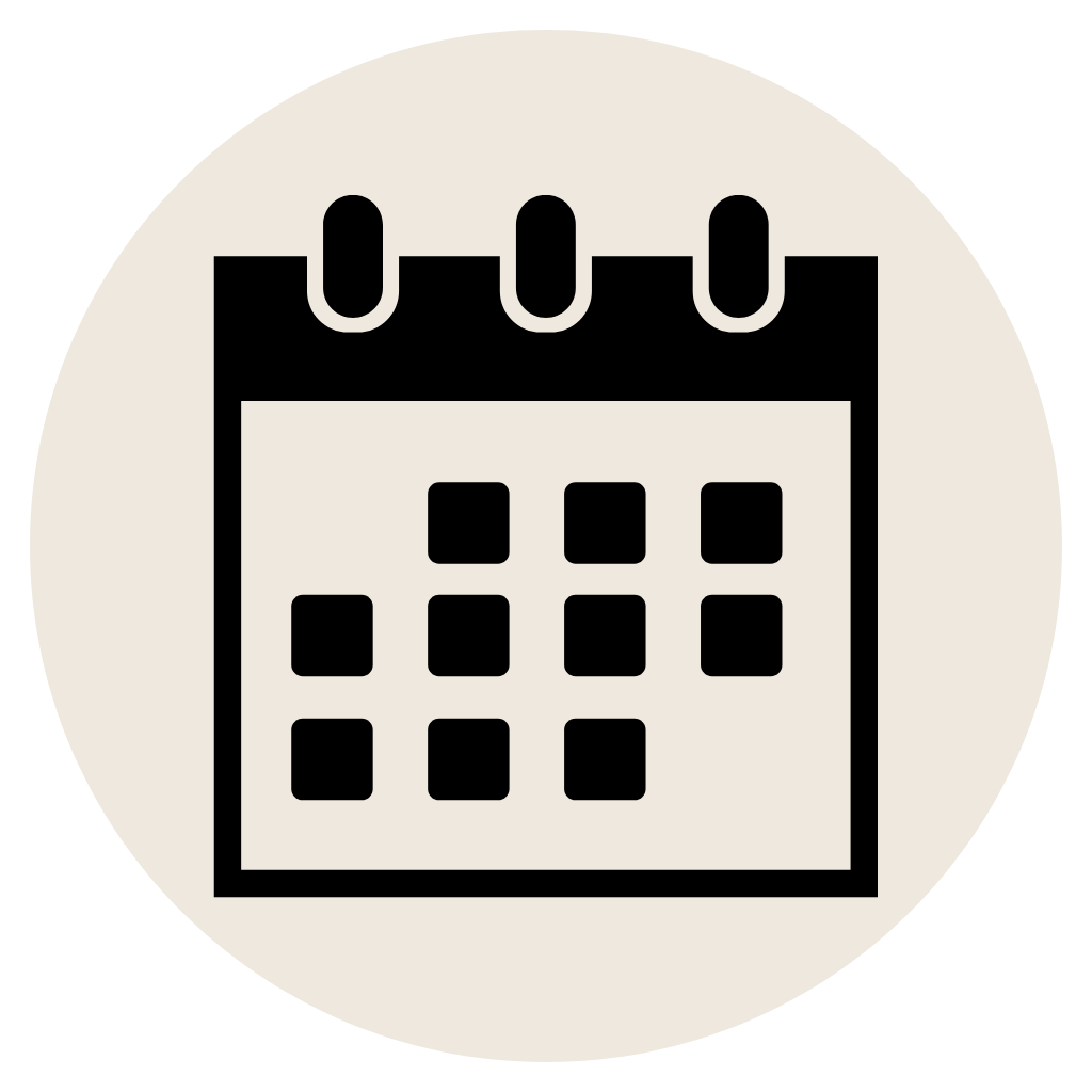 Icon of a calendar with a grid of dates inside a circle, indicating scheduling or planning.