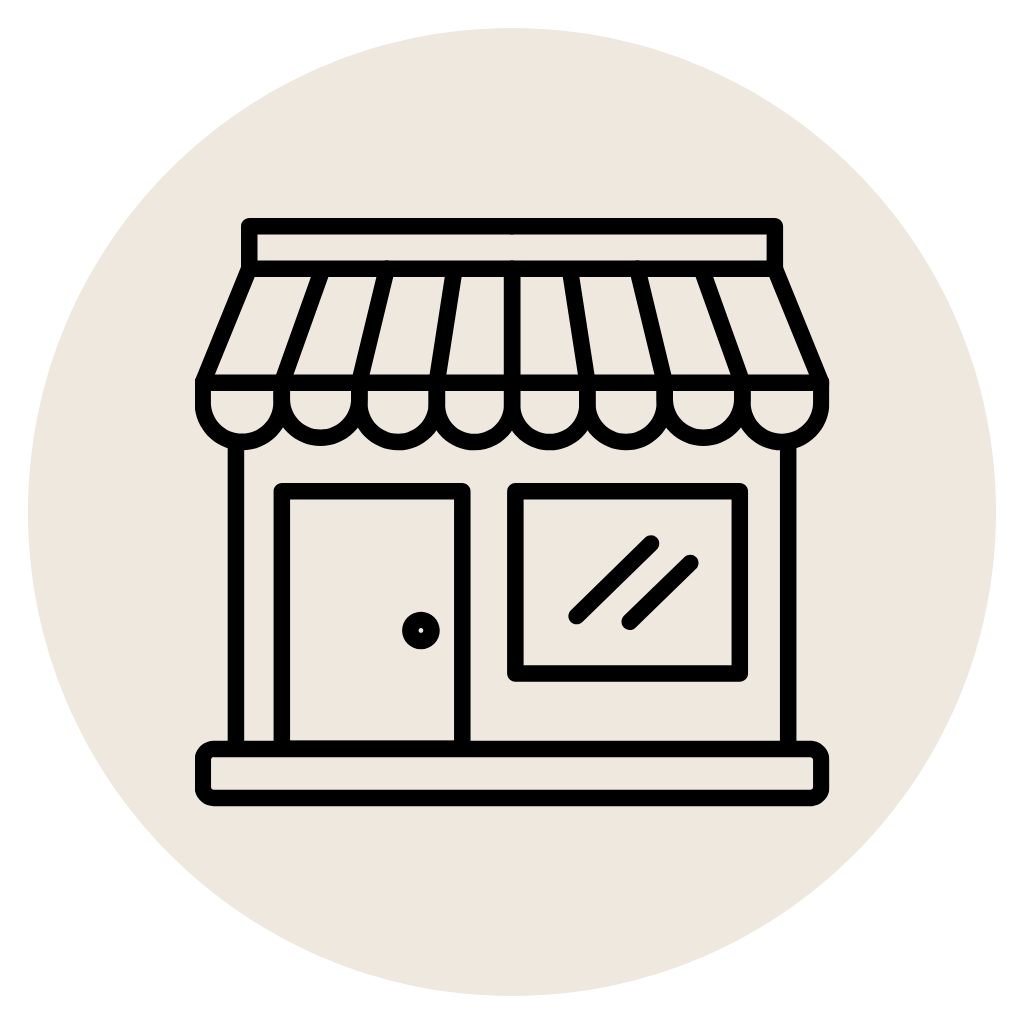 Line drawing of a small shop with a striped awning, a door and a window.