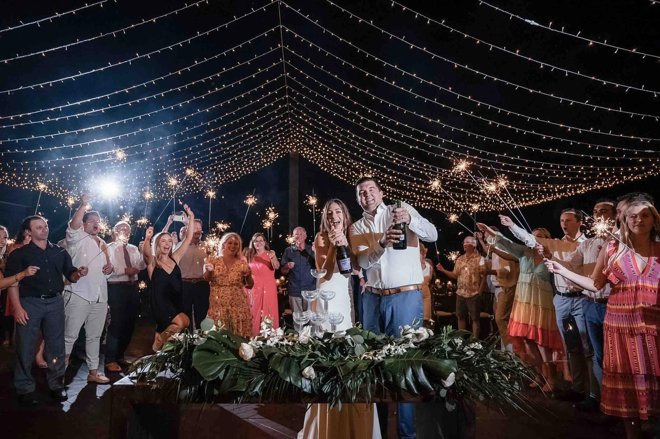 Sparkler toast in Puerto Vallarta beach wedding