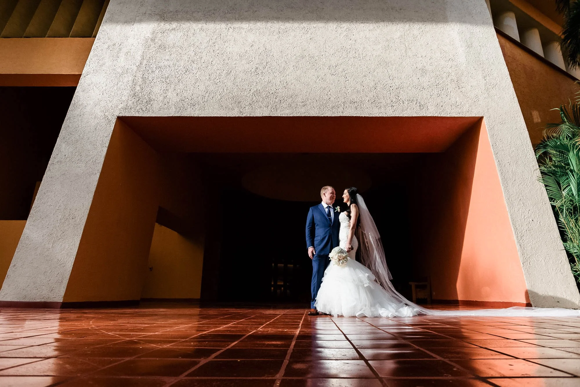 Bride and groom posing at the Puerto Vallarta Westin resort