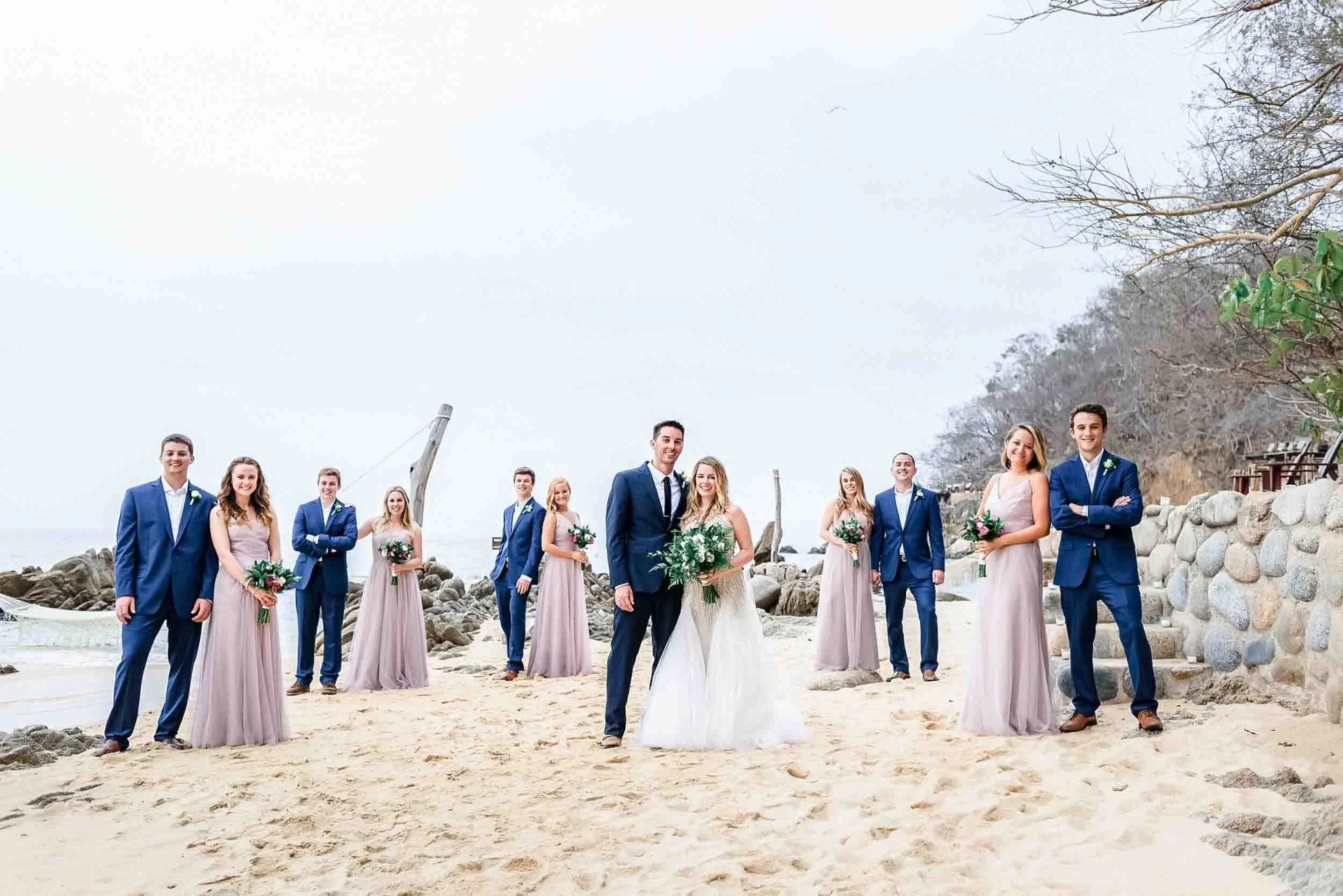 Bridal party portrait at beach in Puerto Vallarta