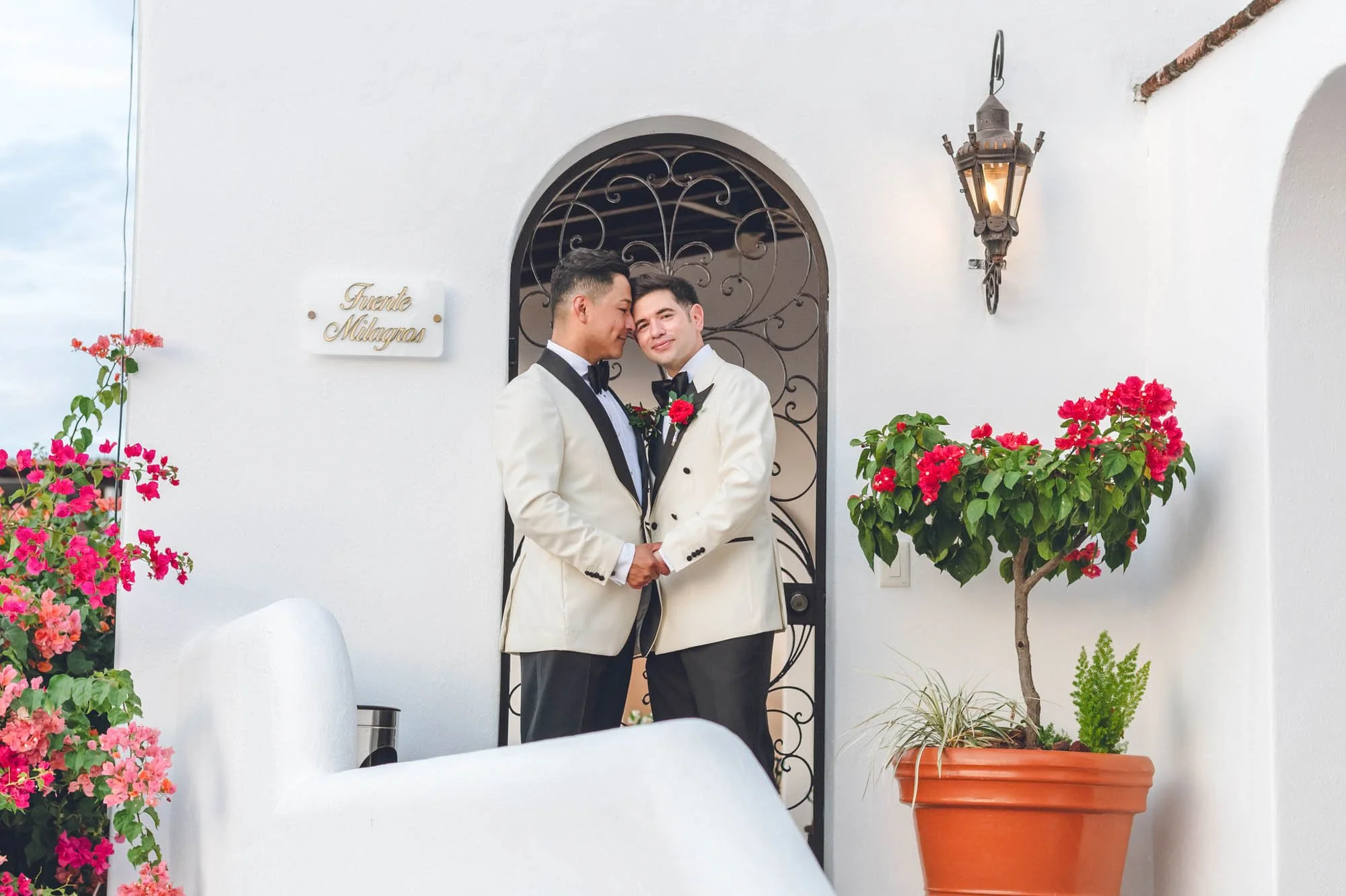 Romantic portrait of gay grooms on their wedding day at the La Cappella venue in Downtown Puerto Vallarta.