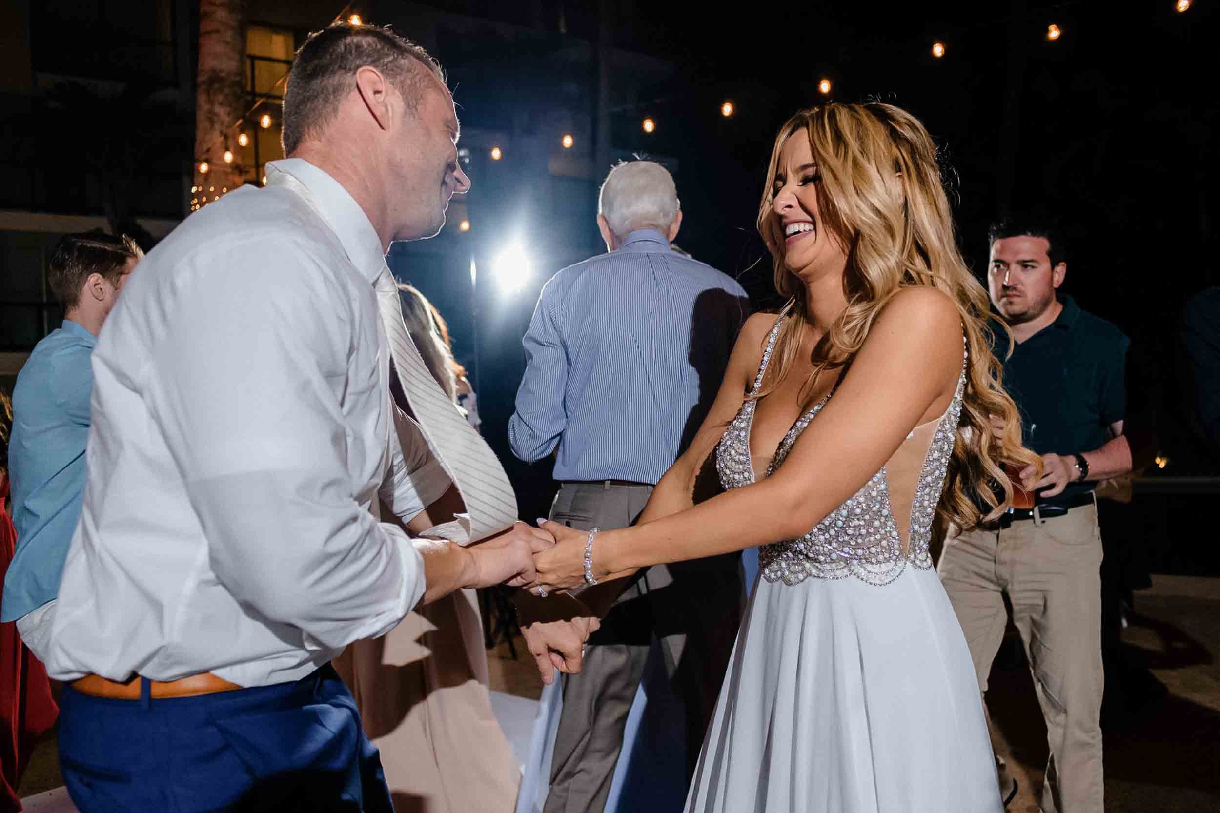 Newlyweds dancing the night away during the reception of their beautiful wedding. 