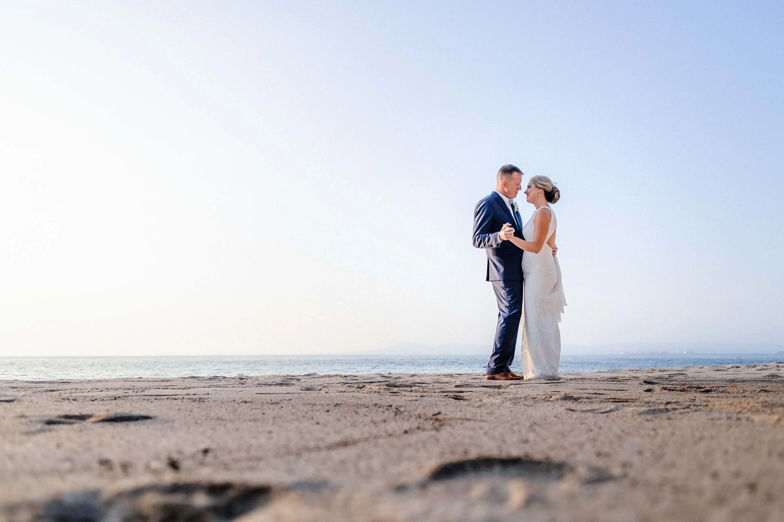 Bride and groom at beach of private villa wedding Vallarta