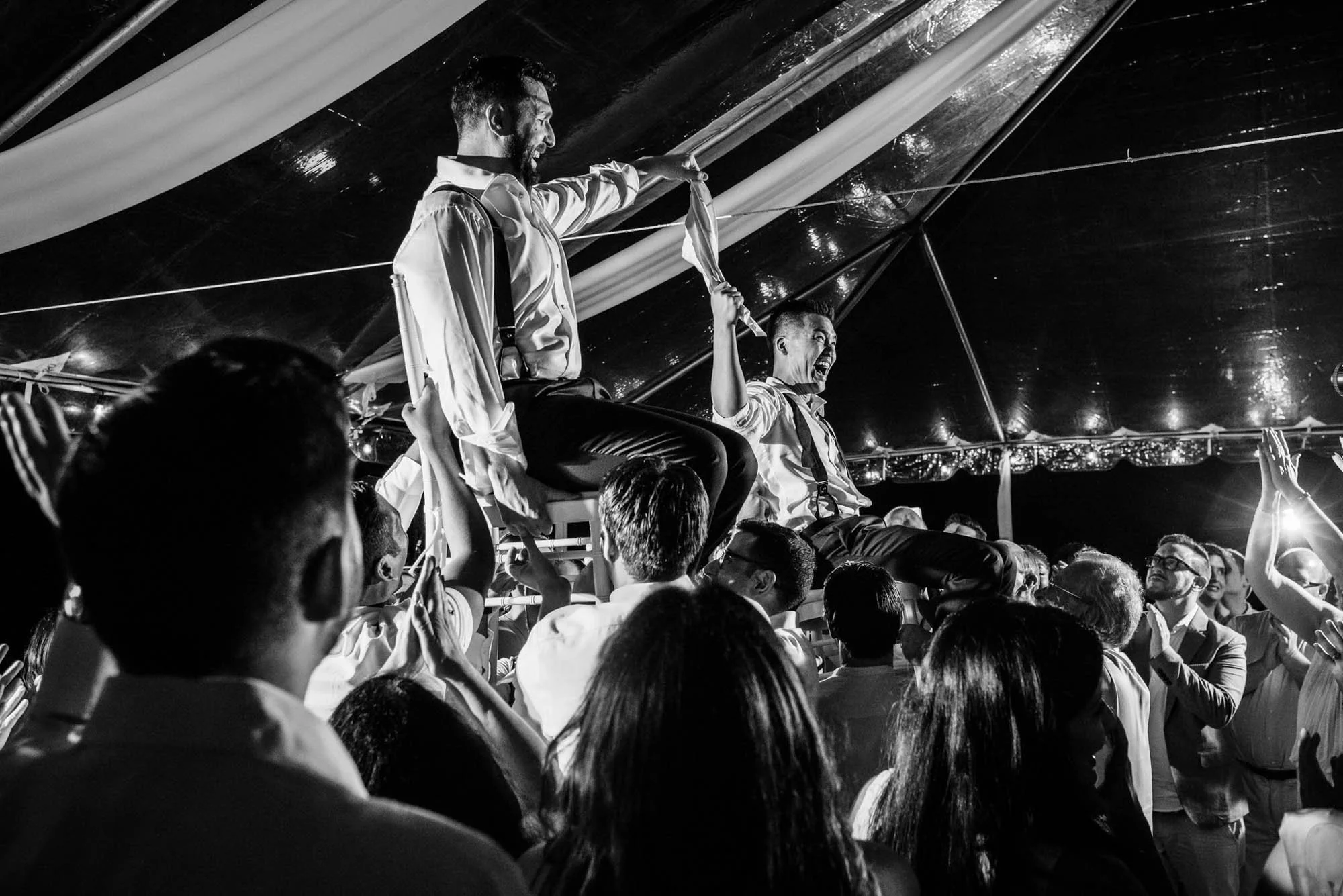 Grooms during the reception of their Jewish Asian destination wedding.