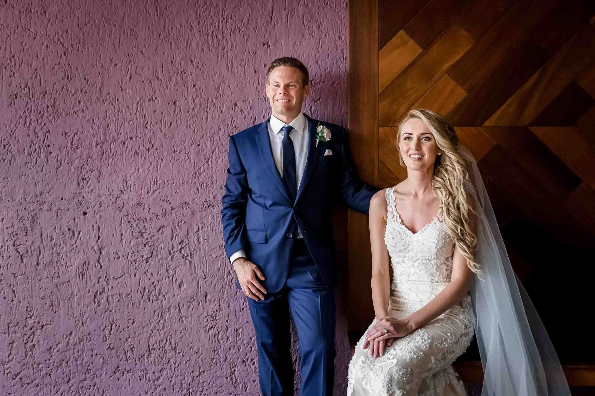 Bride and groom portrait with a minimalistic background. 