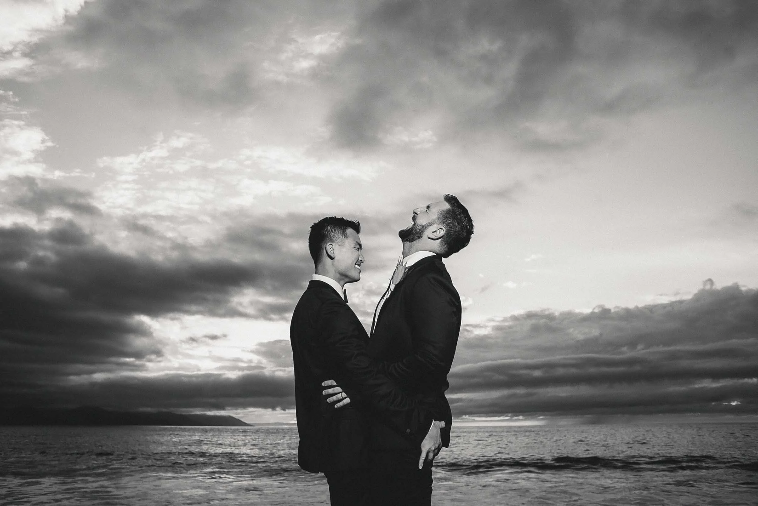 Happy gay grooms at the Hyatt Ziva beach on their wedding day