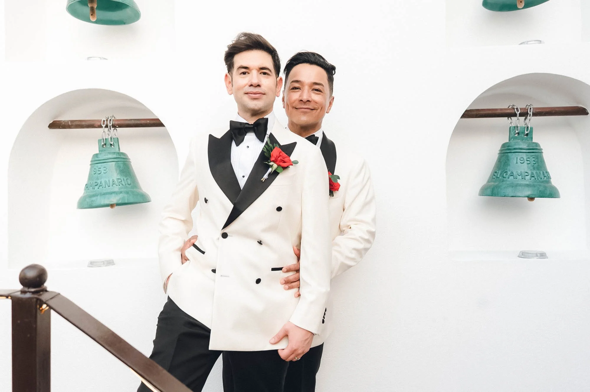 Grooms posing for portraits after their wedding ceremony at the beautiful La Cappella Restaurant in Puerto Vallarta