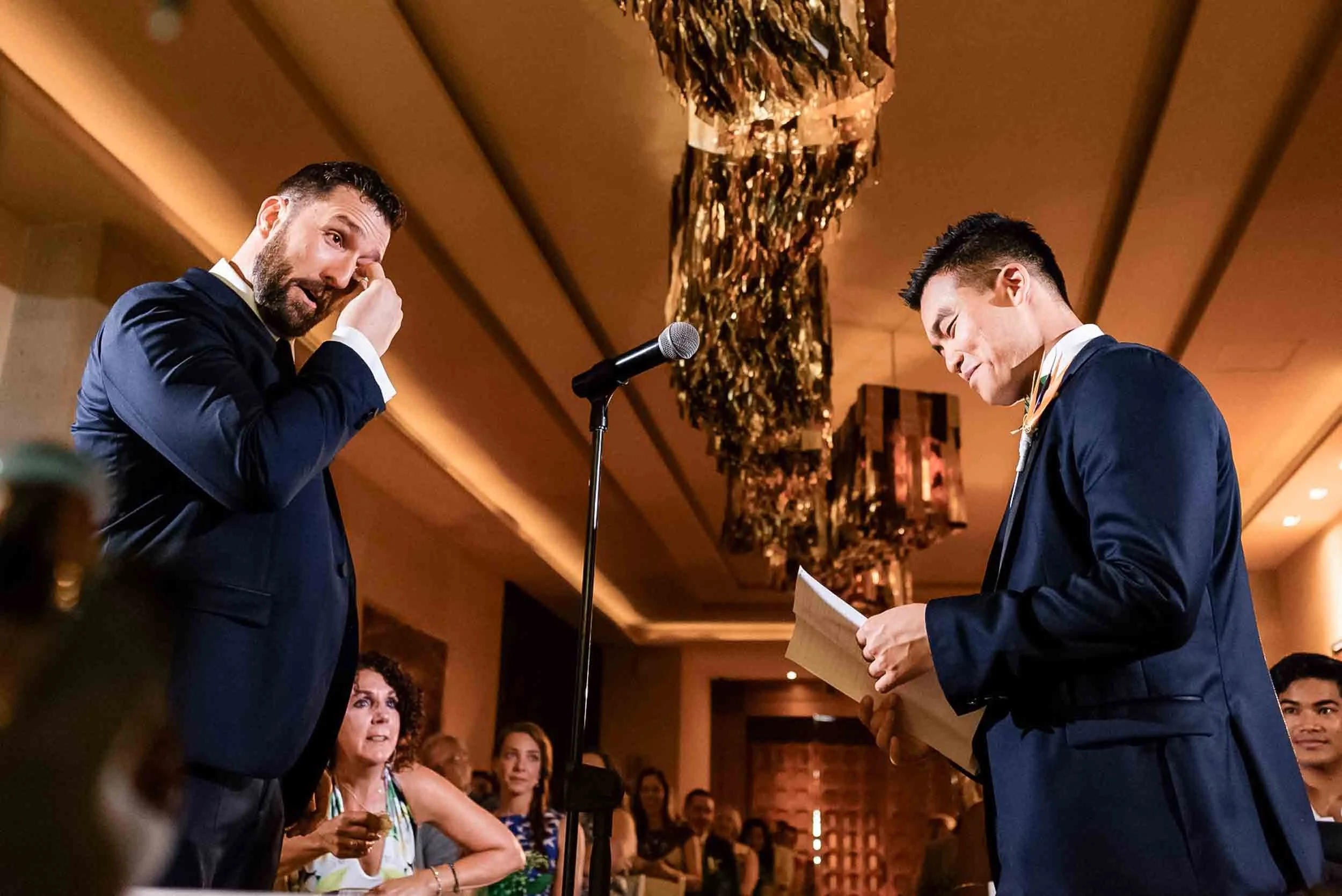 Emotional groom during the vow exchange at their destination wedding ceremony.