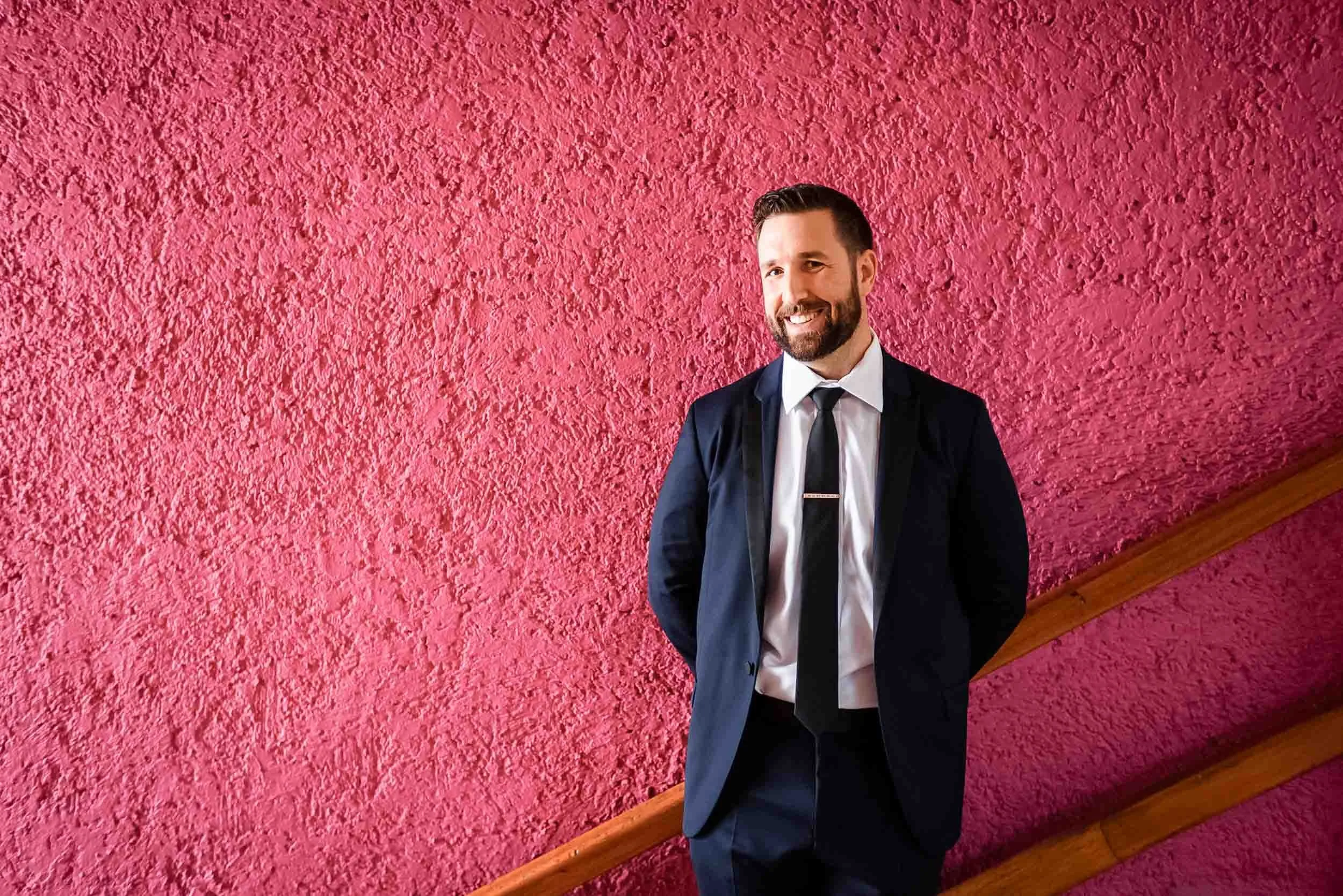Portrait of gay groom before heading to wedding ceremony.