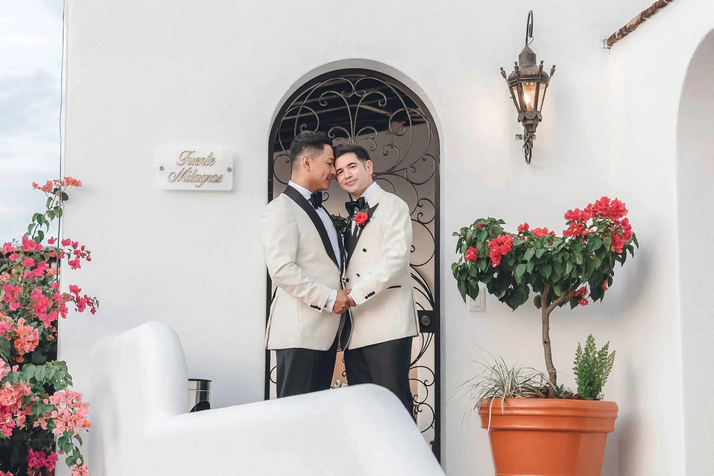 Romantic portrait of grooms on their wedding day at the La Capella venue in Downtown Puerto Vallarta
