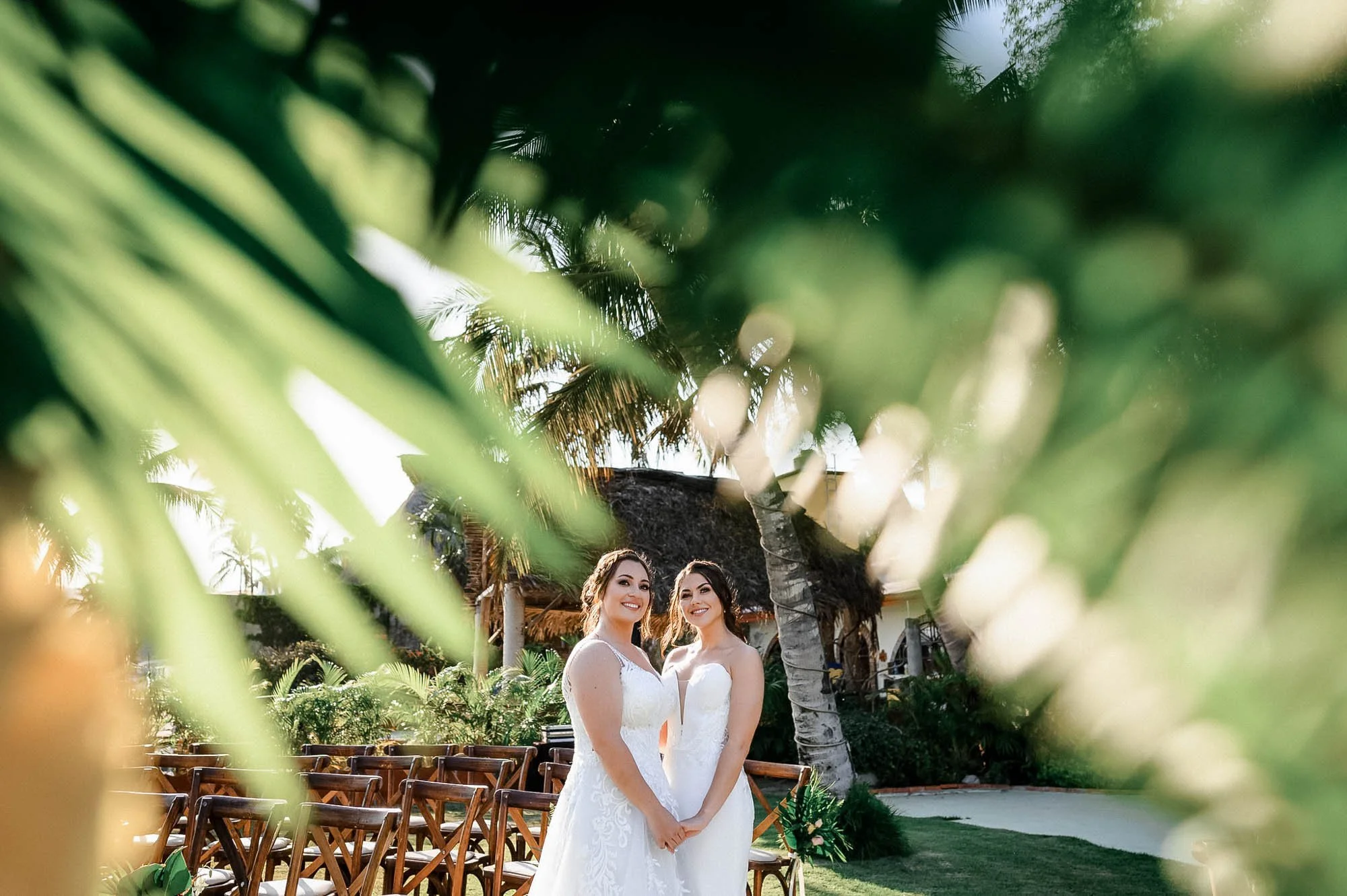 Lesbian bridal portrait at beach destination wedding. 