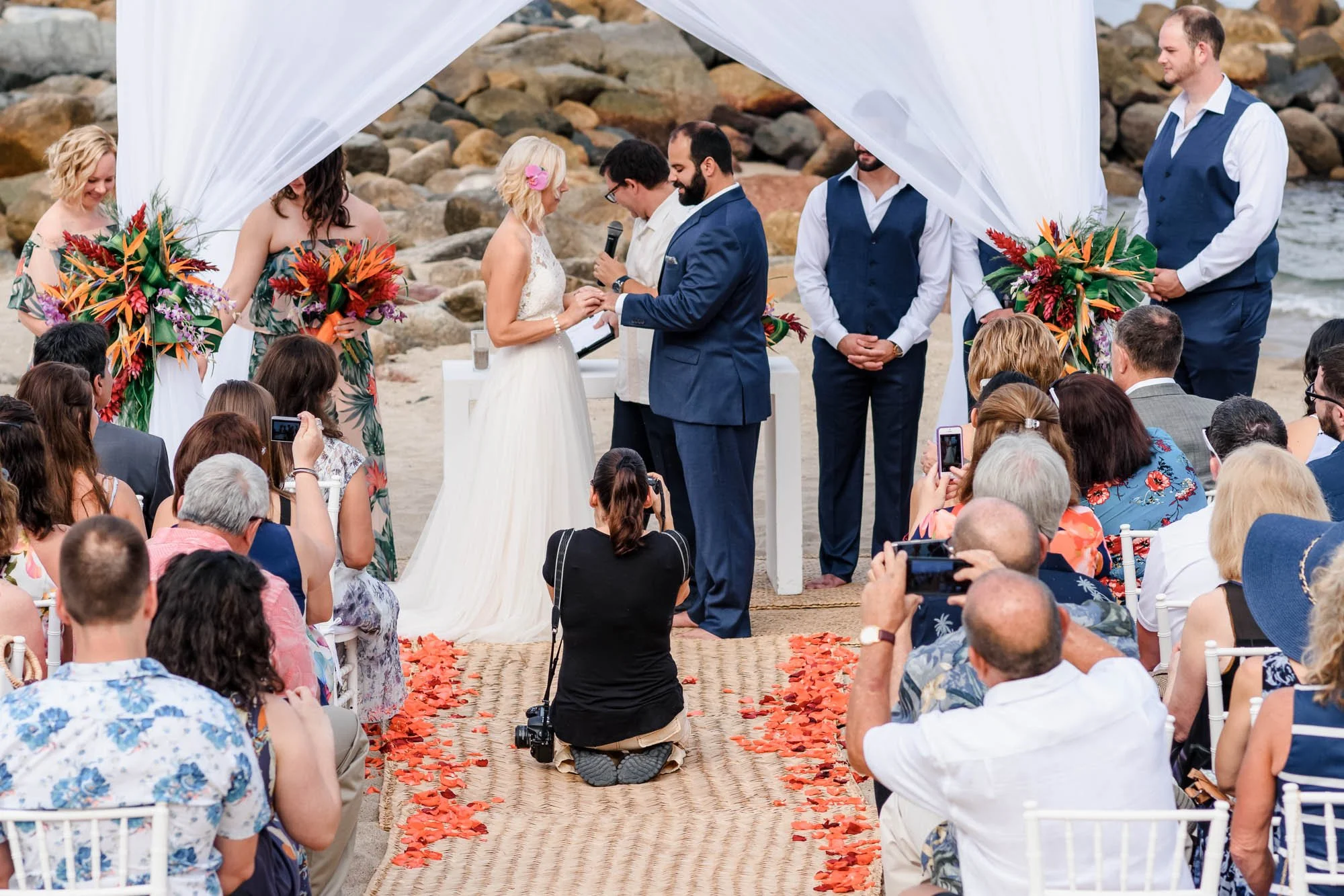 Wedding photographer working during ceremony