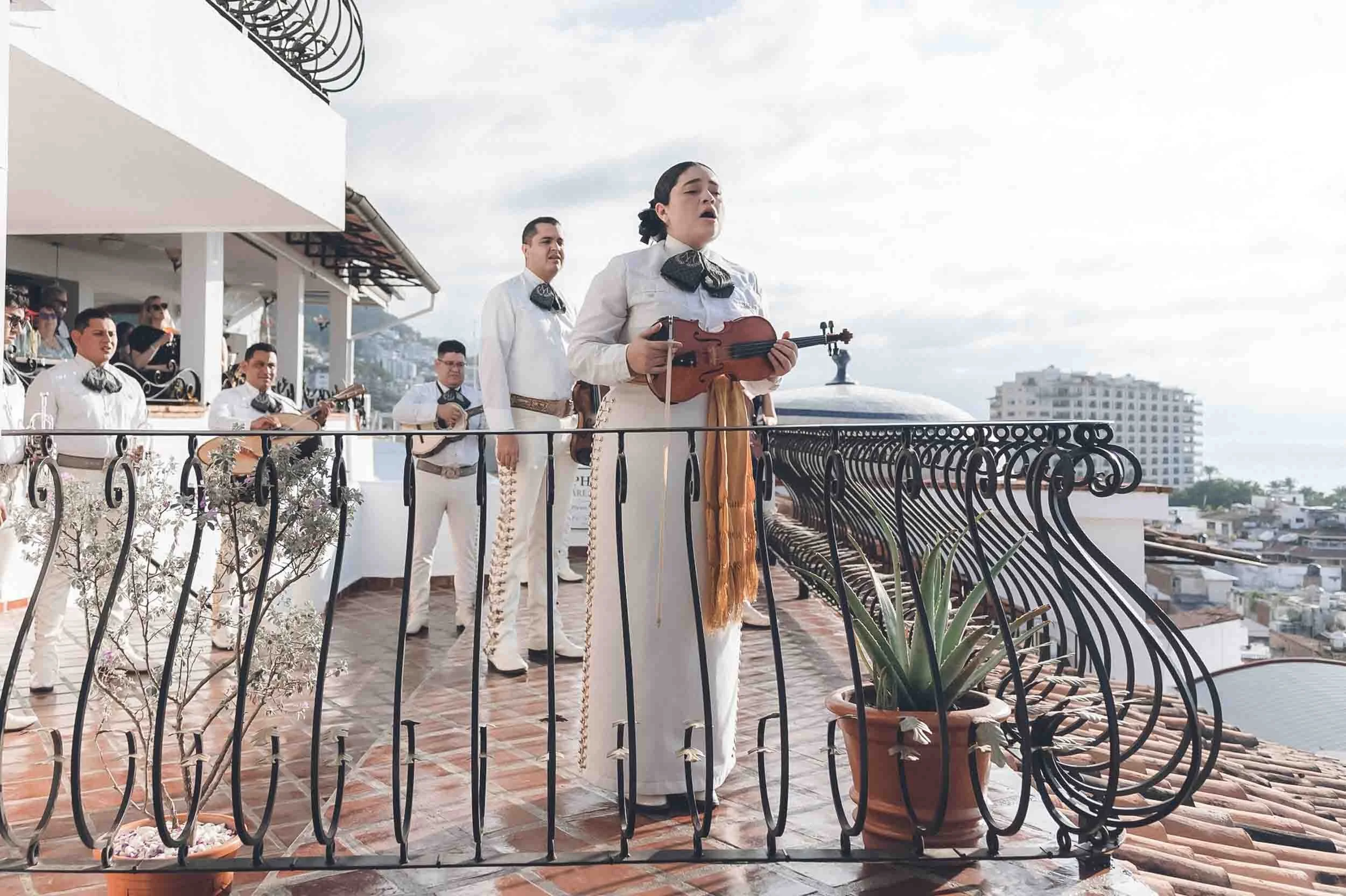 Mariachi singing on balcony of La Capella venue in Puerto Vallarta.