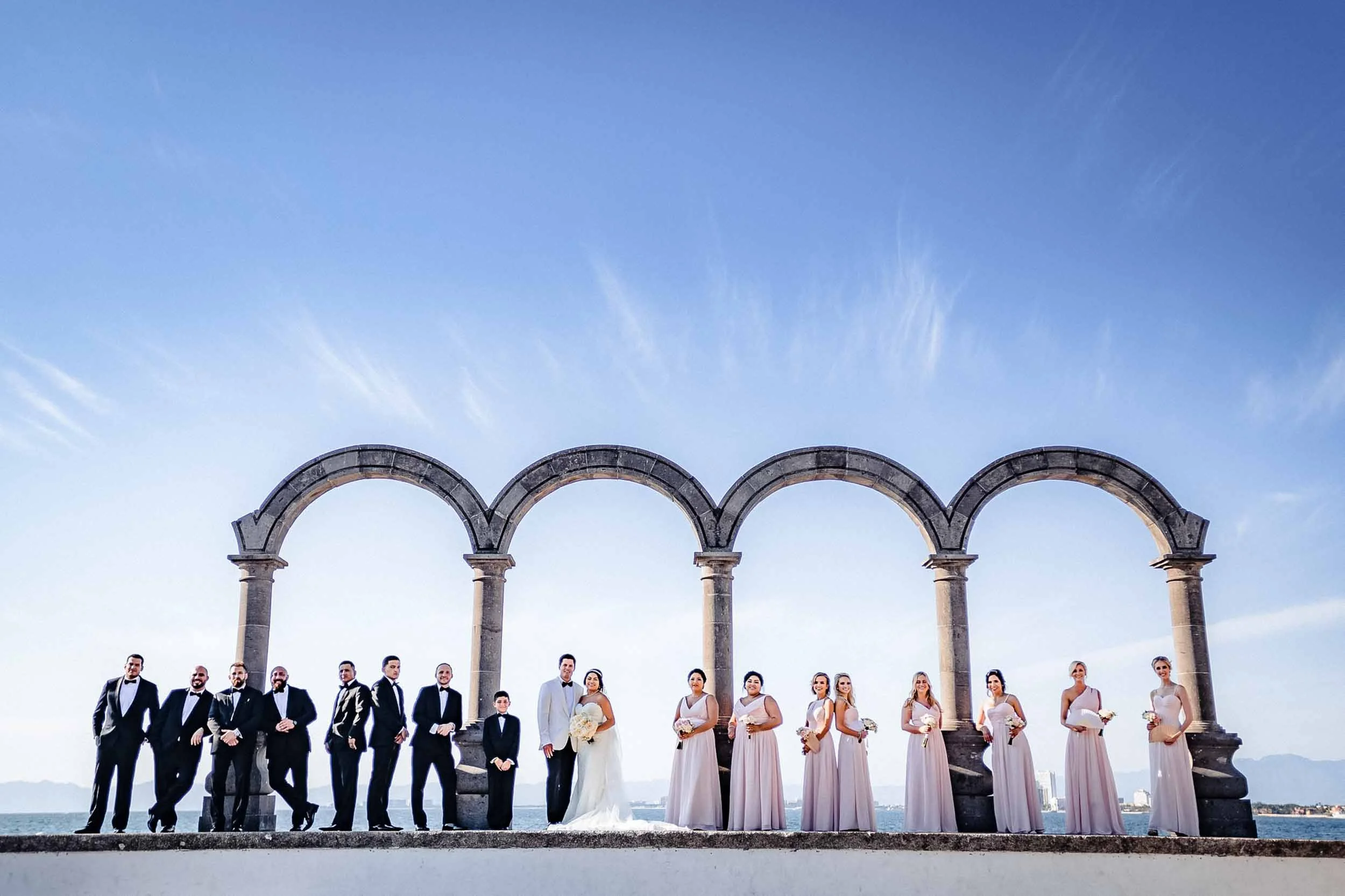 Bridal party portrait at Puerto Vallarta downtown boardwalk